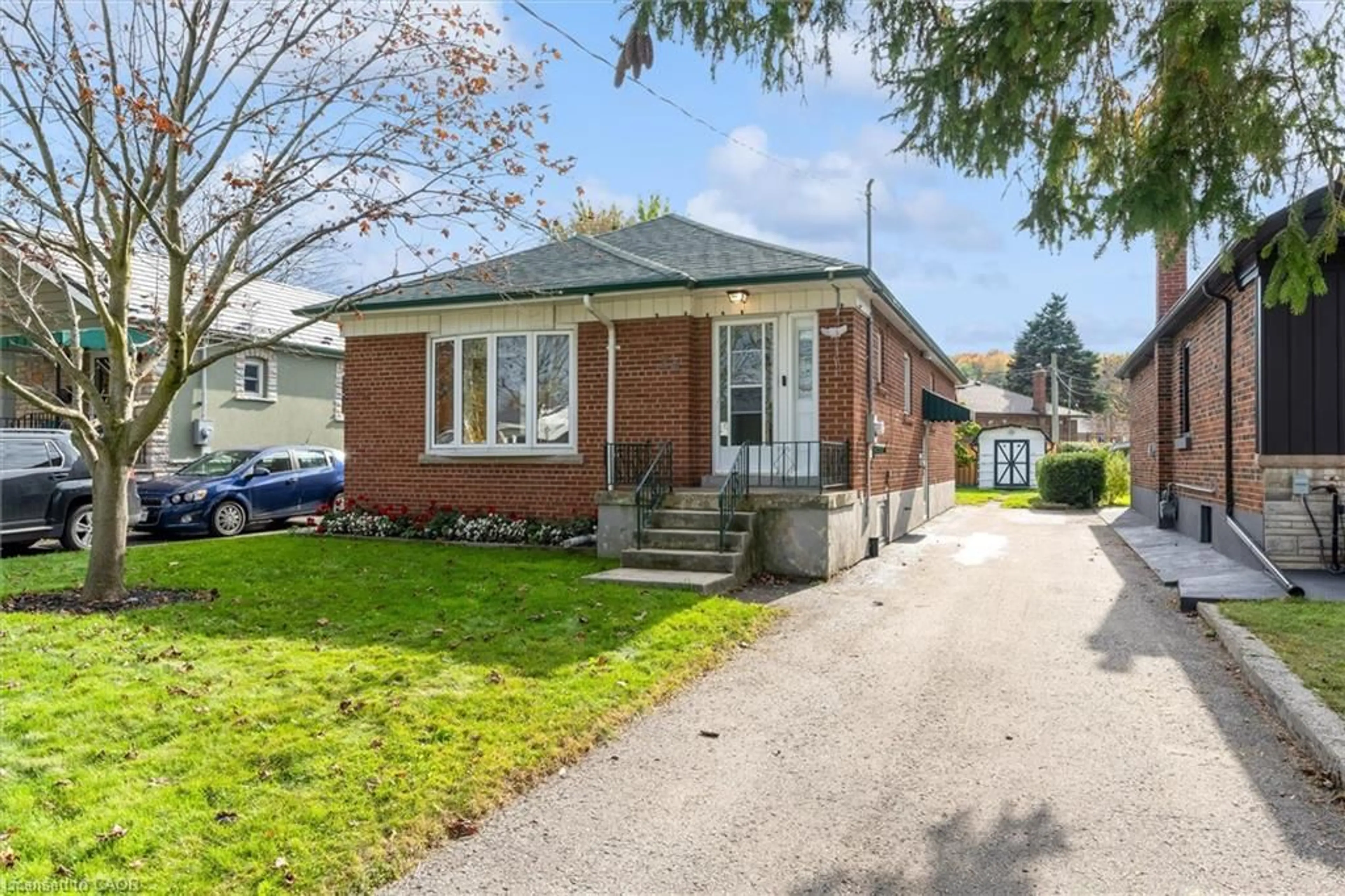 Home with brick exterior material, street for 24 Muldrew Ave, Toronto Ontario M1R 1X5
