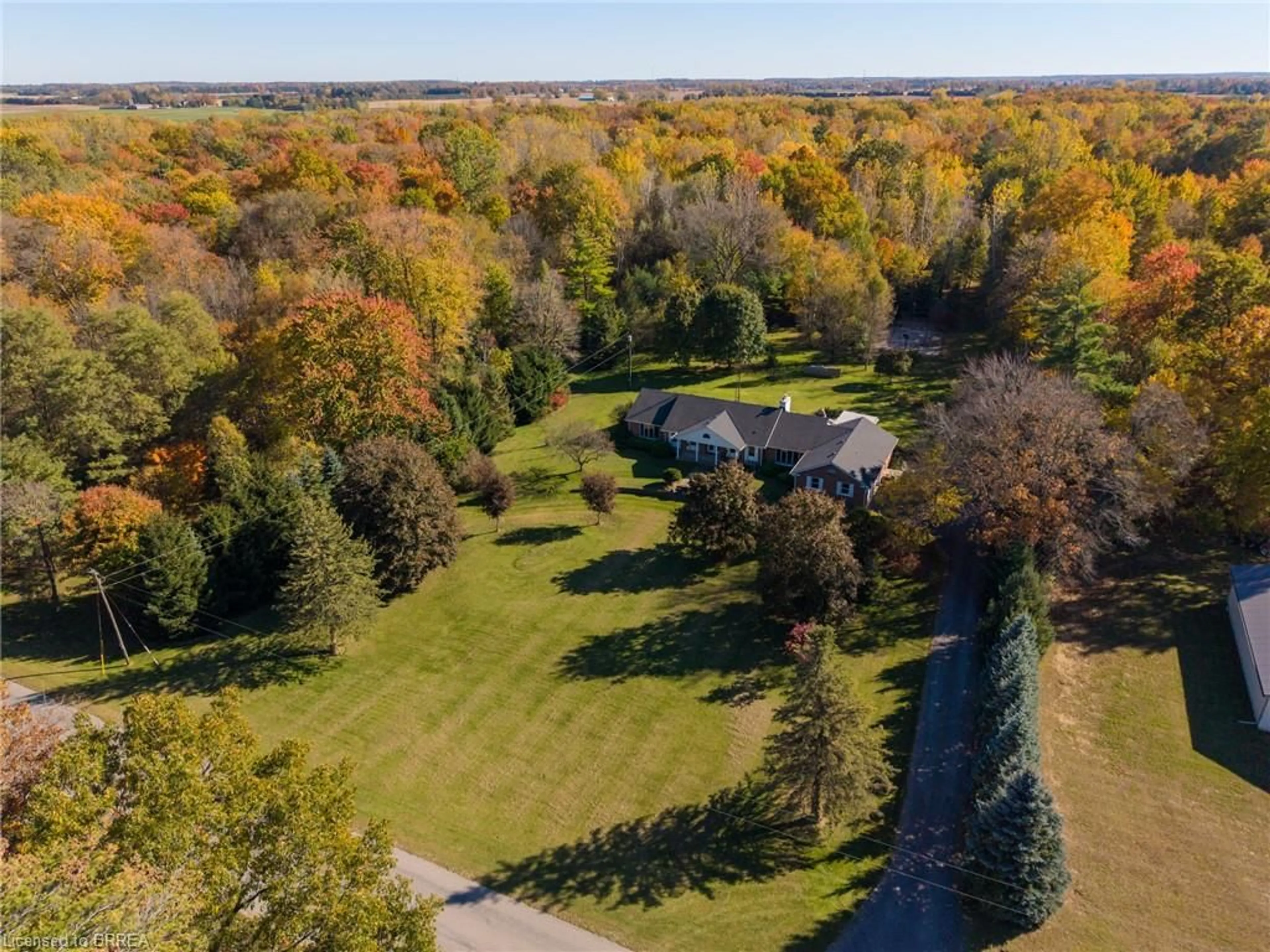 A pic from outside/outdoor area/front of a property/back of a property/a pic from drone, forest/trees view for 1834 Windham Rd 9, Windham Centre Ontario N0A 2A0