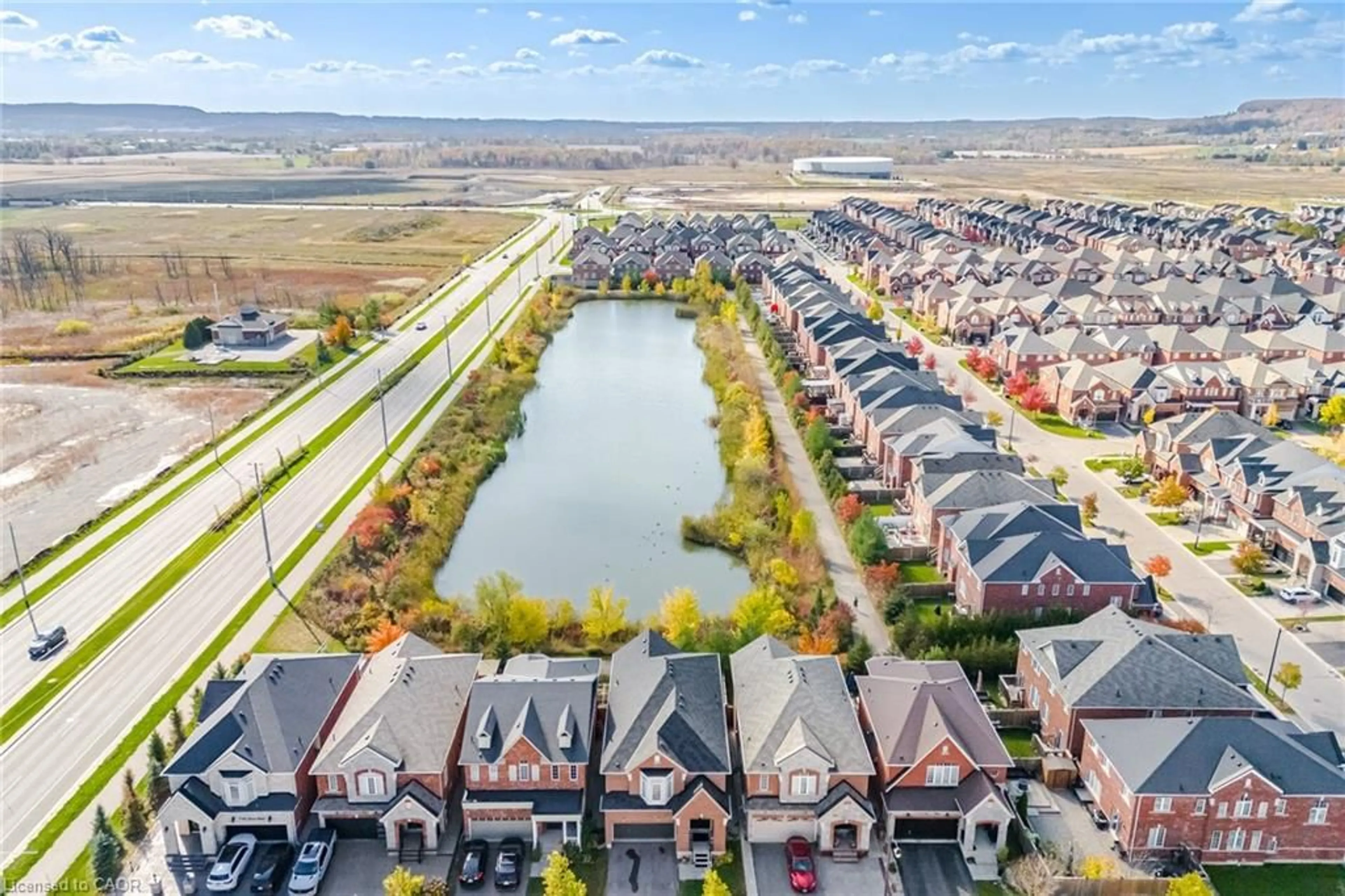 A pic from outside/outdoor area/front of a property/back of a property/a pic from drone, water/lake/river/ocean view for 1161 Durno Crt, Milton Ontario L9T 8P6
