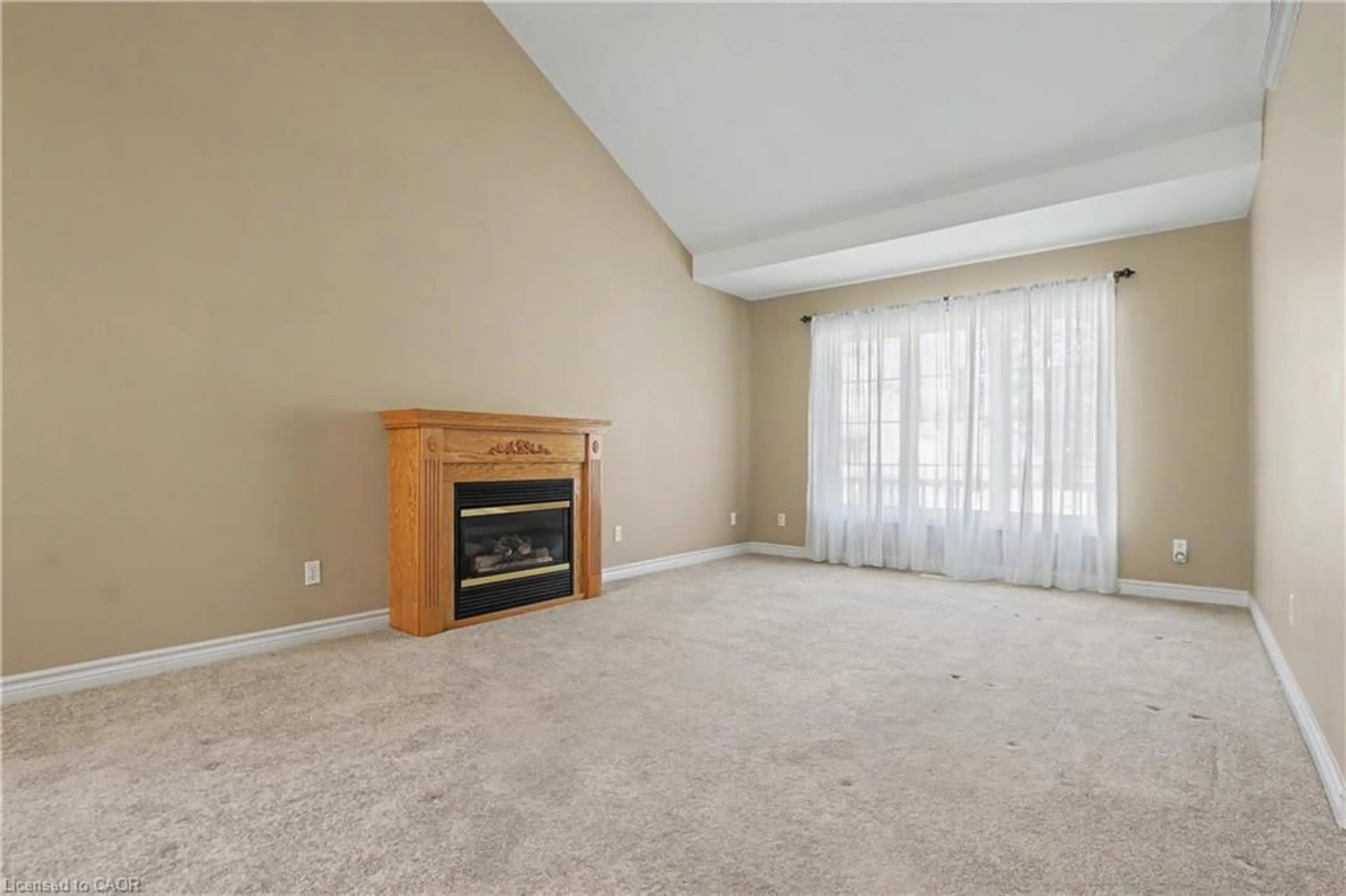 Living room with furniture, carpet floor for 47 Main St N St #14, Waterdown Ontario L9H 2P7