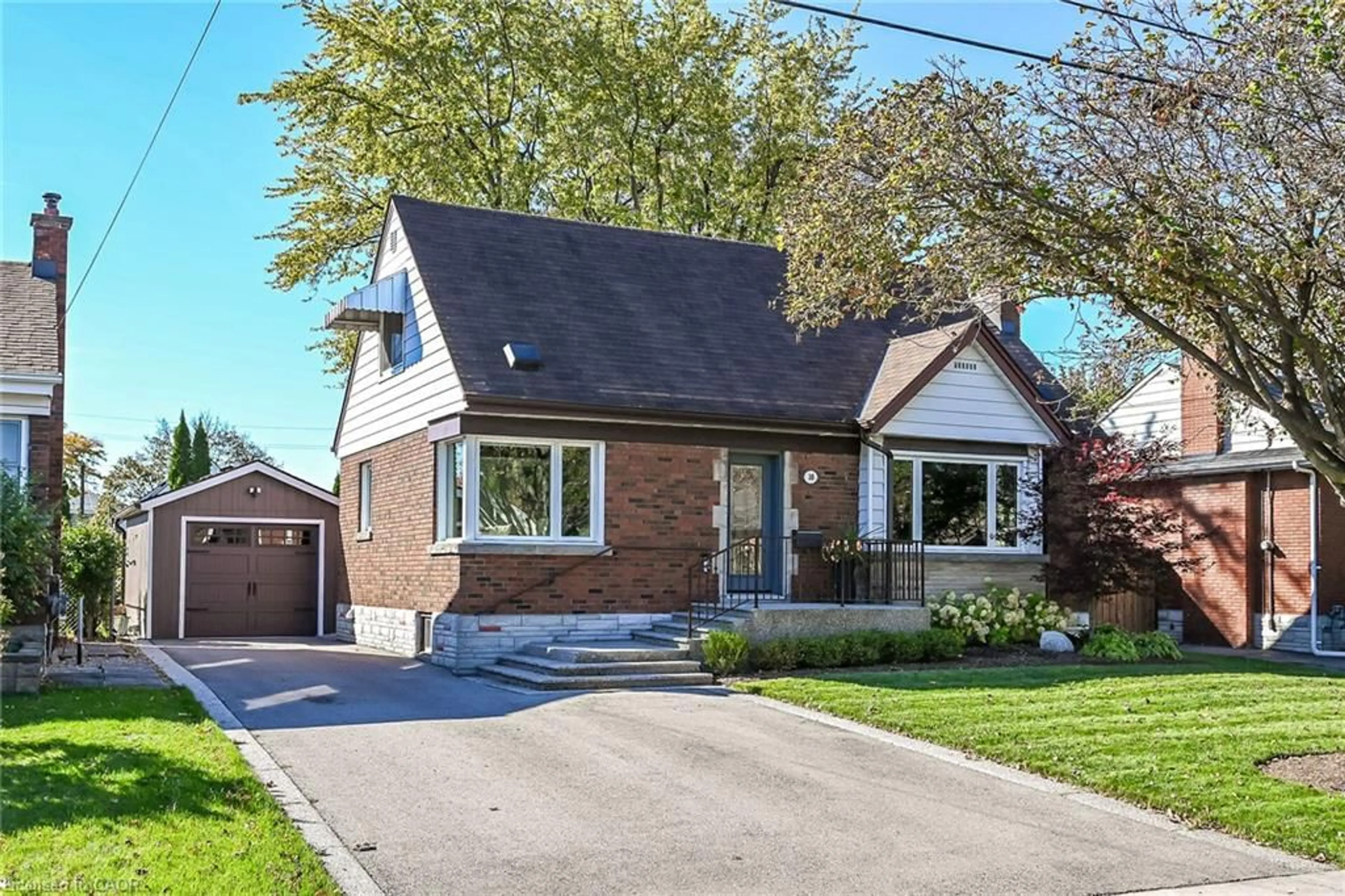 Home with brick exterior material, street for 10 Mulock Ave, Hamilton Ontario L8T 1H3