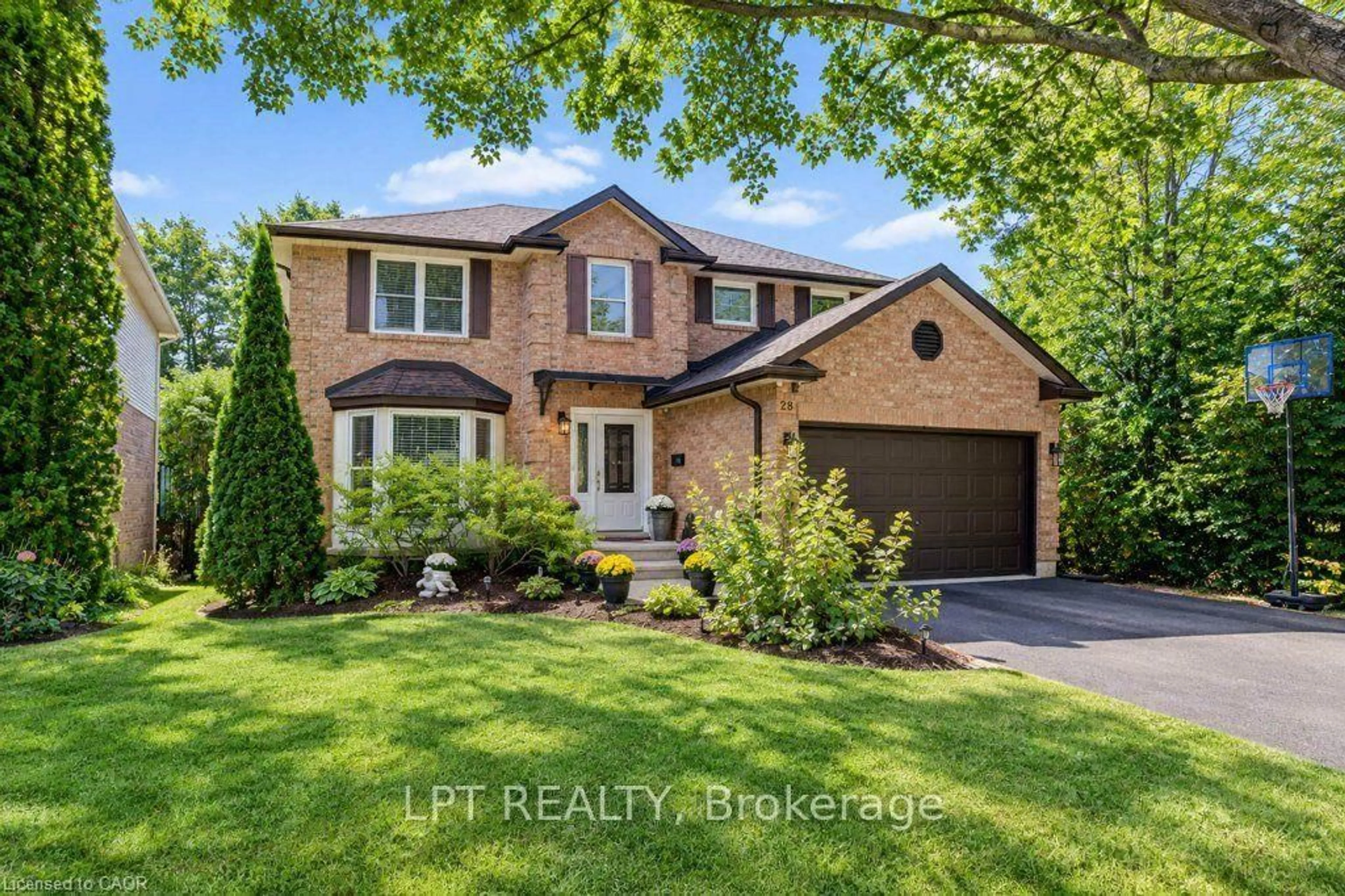Home with brick exterior material, street for 28 Bridlewood Dr, Guelph Ontario N1G 4B2