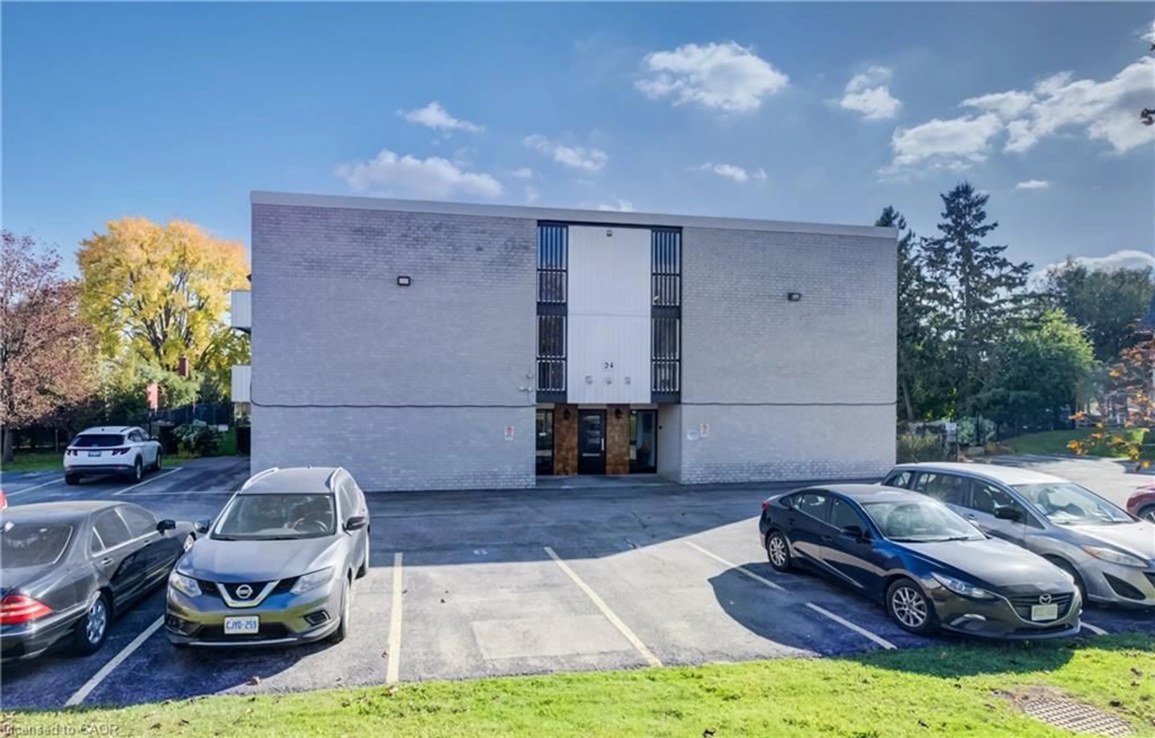 A pic from outside/outdoor area/front of a property/back of a property/a pic from drone, building for 24 Mooregate Cres #202, Kitchener Ontario N2M 2G1