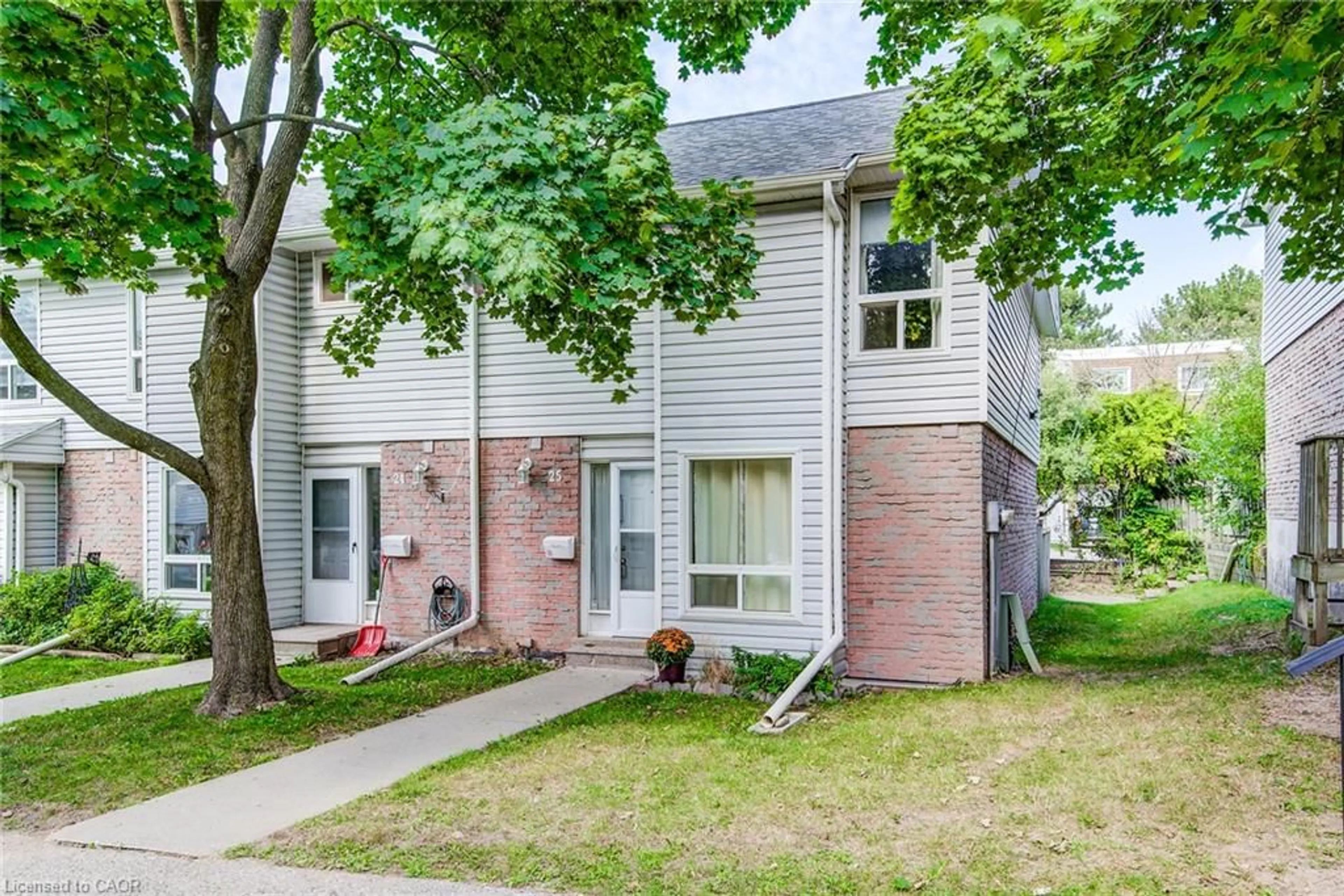 Home with brick exterior material, street for 32 Mowat Blvd #25, Kitchener Ontario N2E 1X4