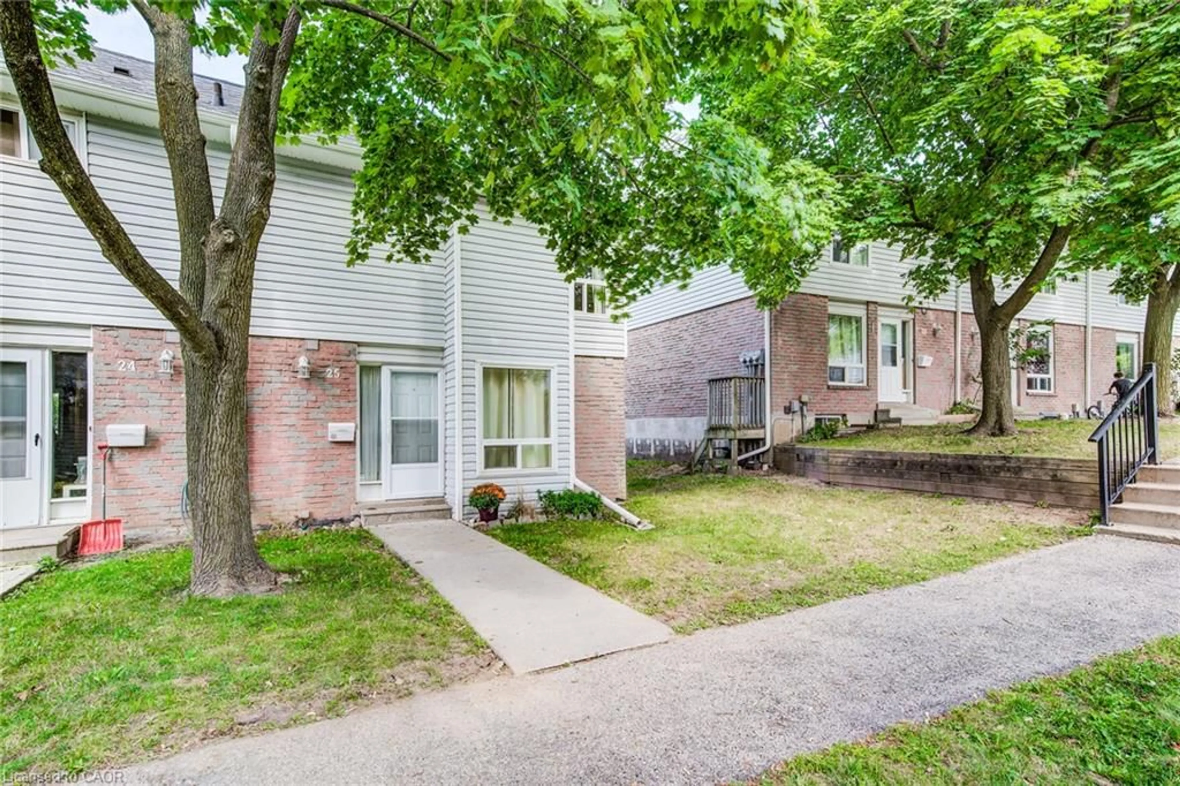 Home with brick exterior material, street for 32 Mowat Blvd #25, Kitchener Ontario N2E 1X4