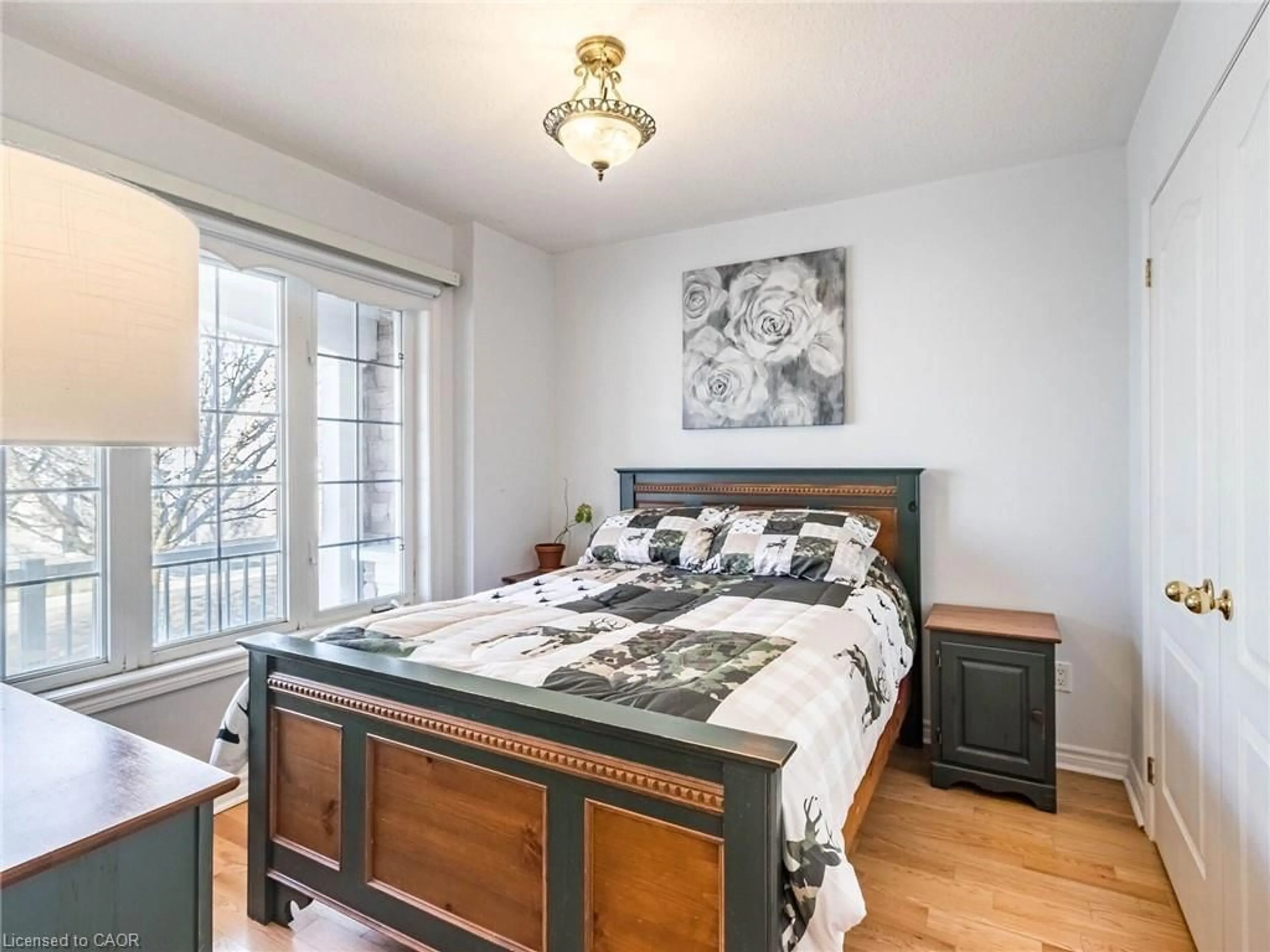 Bedroom with bed, wood/laminate floor for 350 Lakebreeze Dr #8, Clarington Ontario L1B 1N2