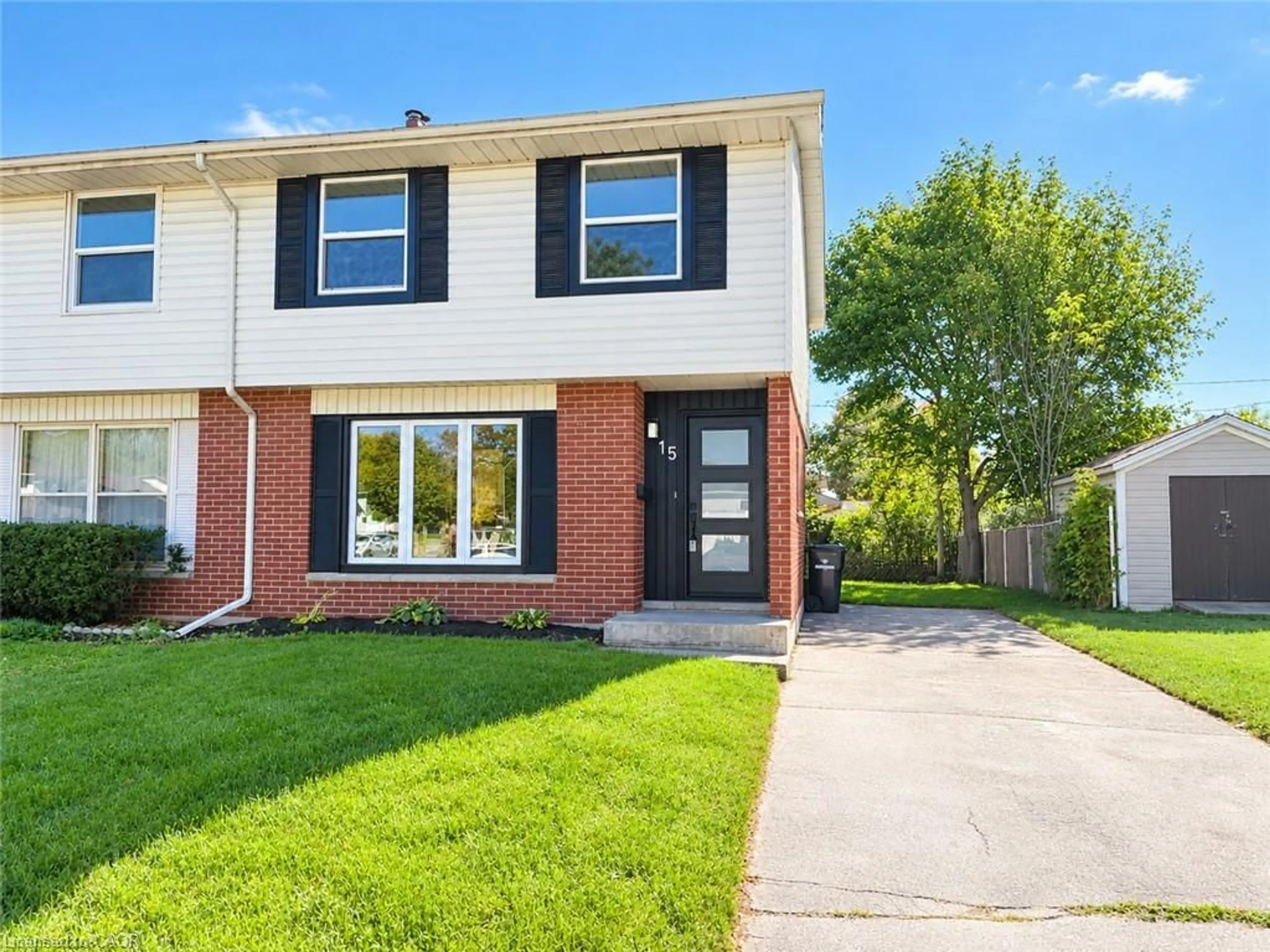 Home with brick exterior material, street for 15 Currie St, Cambridge Ontario N1P 1A2