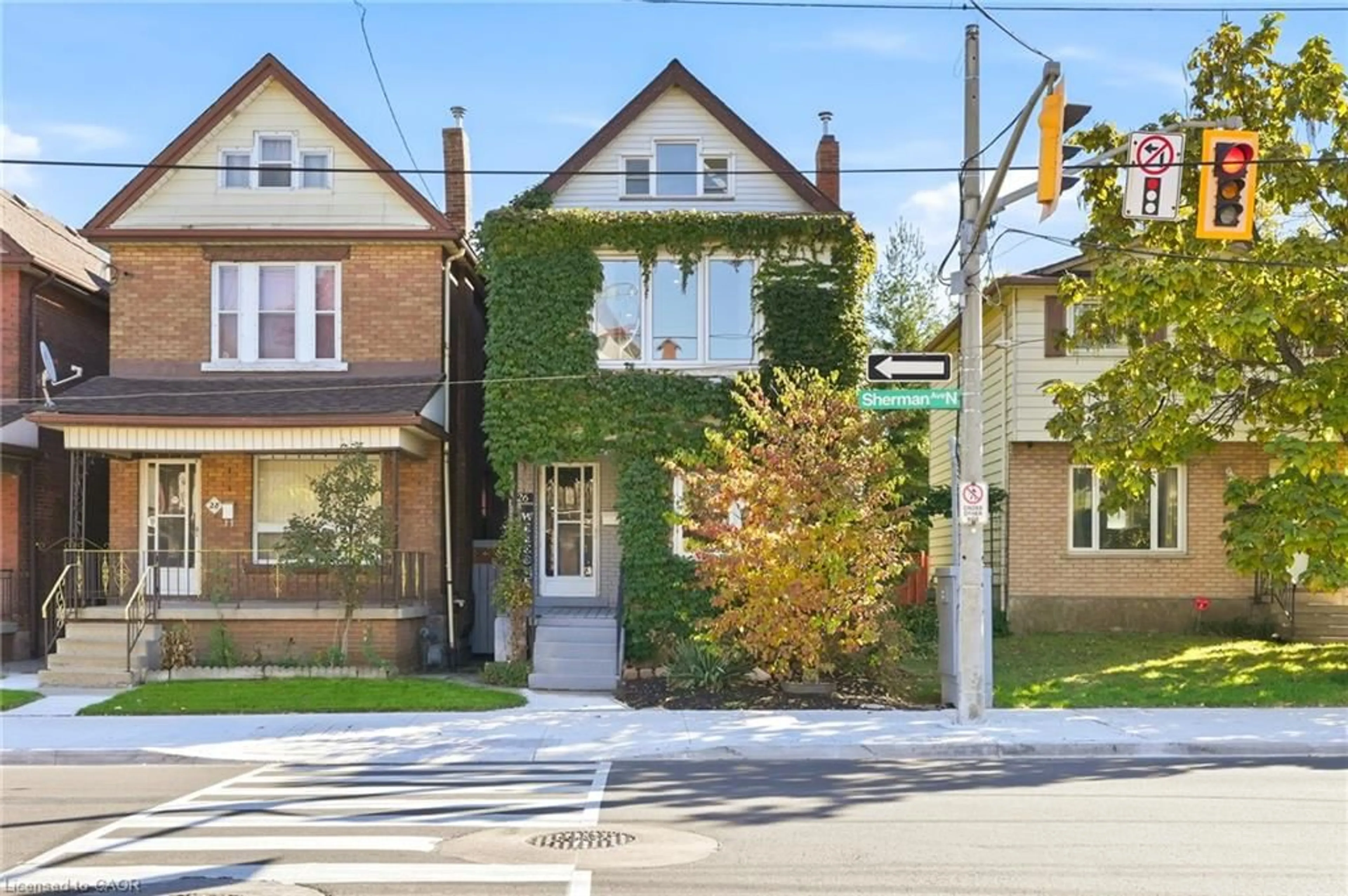 Home with brick exterior material, street for 26 Sherman Ave, Hamilton Ontario L8L 6L8