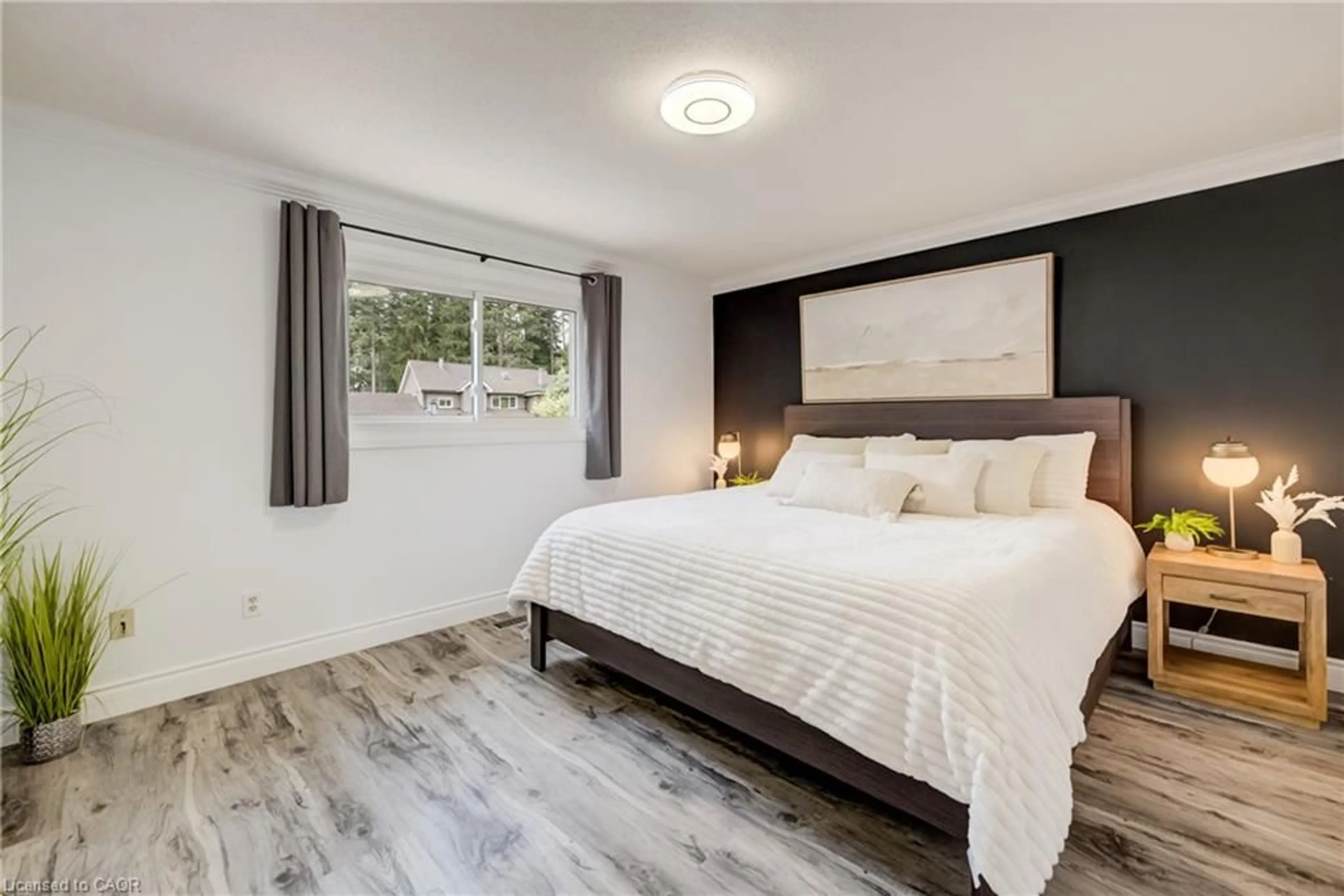 Bedroom with bed, wood/laminate floor for 85 Foxhunt Rd, Waterloo Ontario N2K 2R8