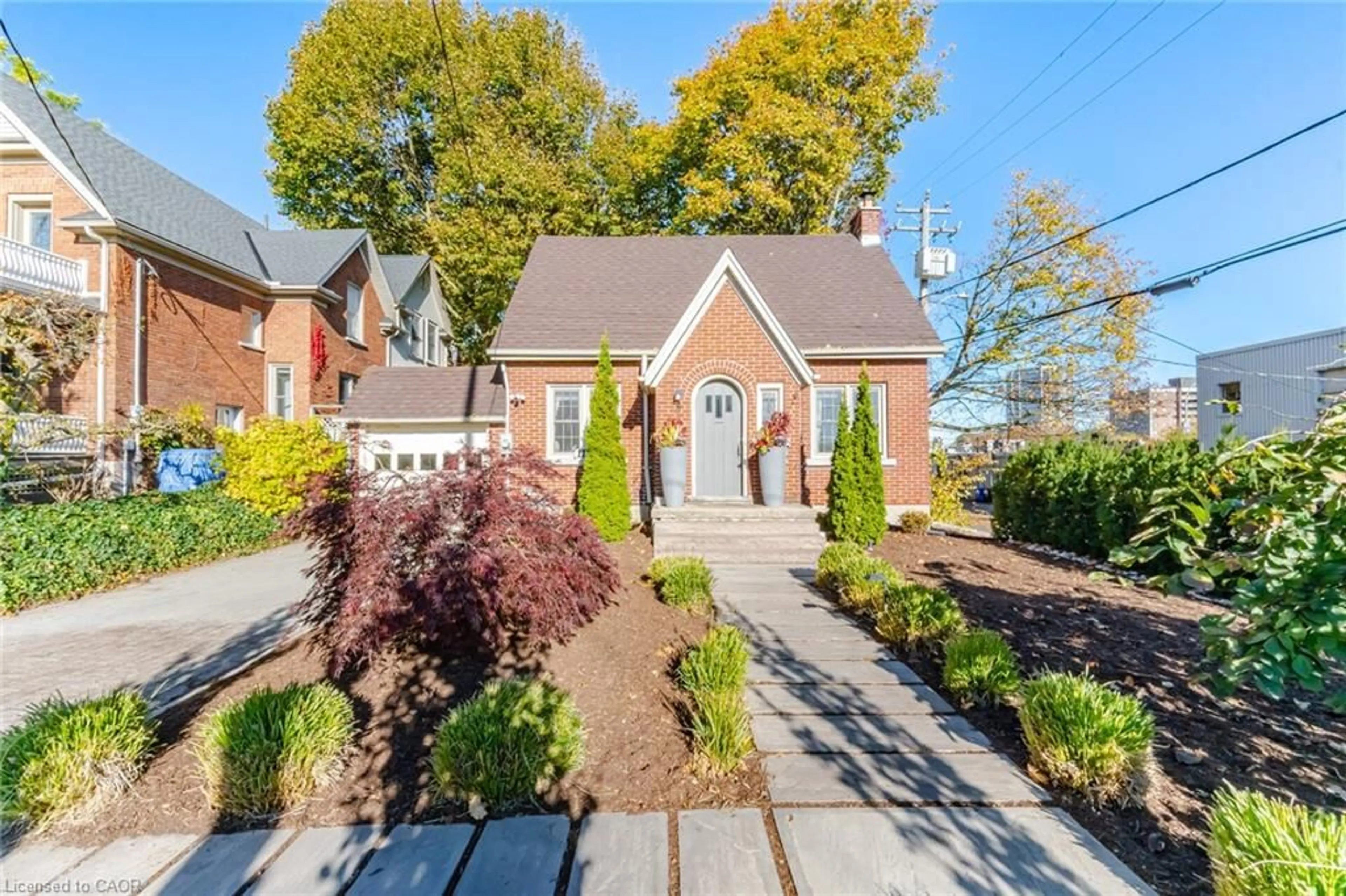 Home with brick exterior material, street for 11 Rock Ave, Kitchener Ontario N2M 2N9