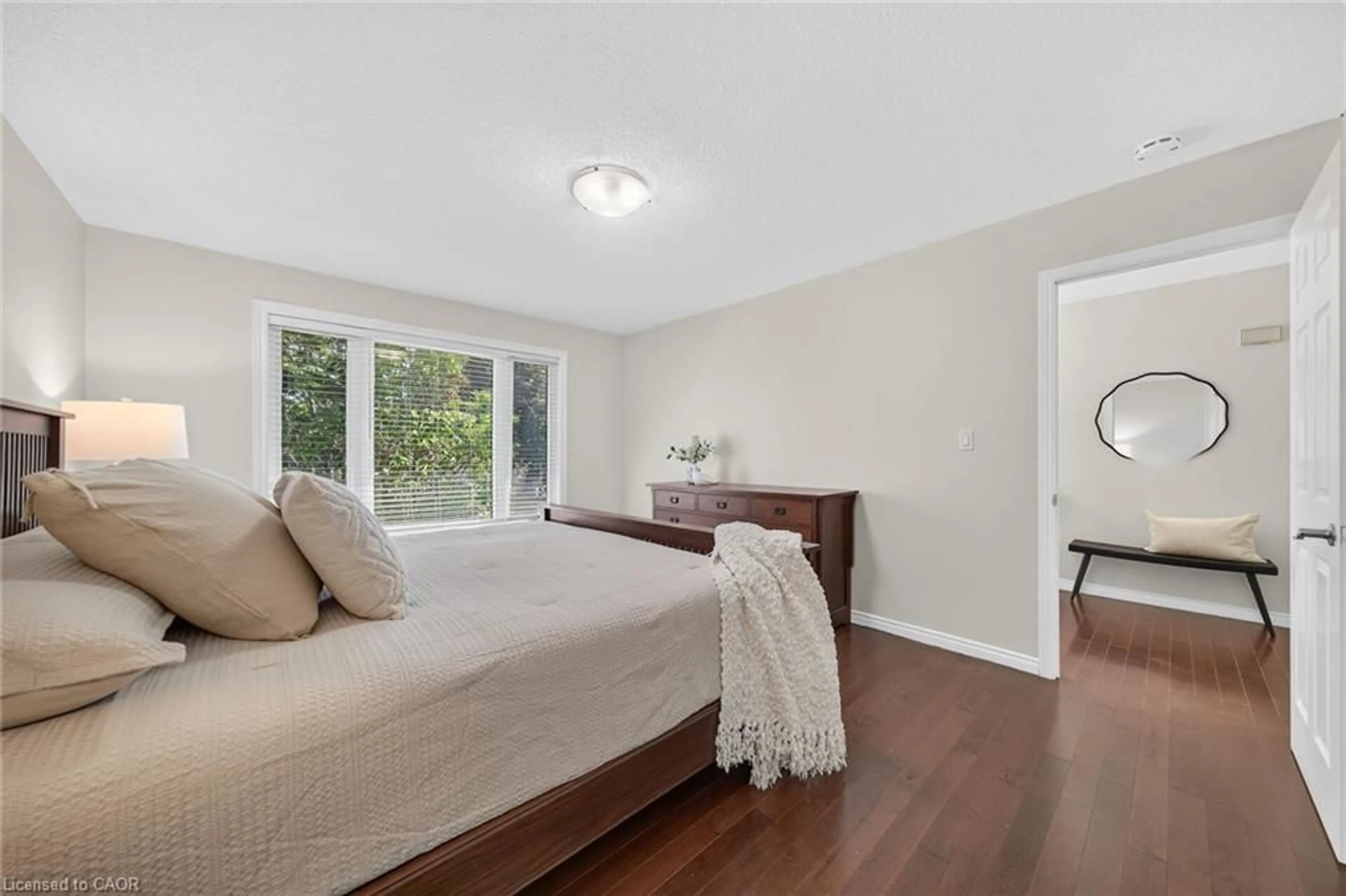 Bedroom with bed, wood/laminate floor for 31 Gilcrest St, Hamilton Ontario L9C 7G9