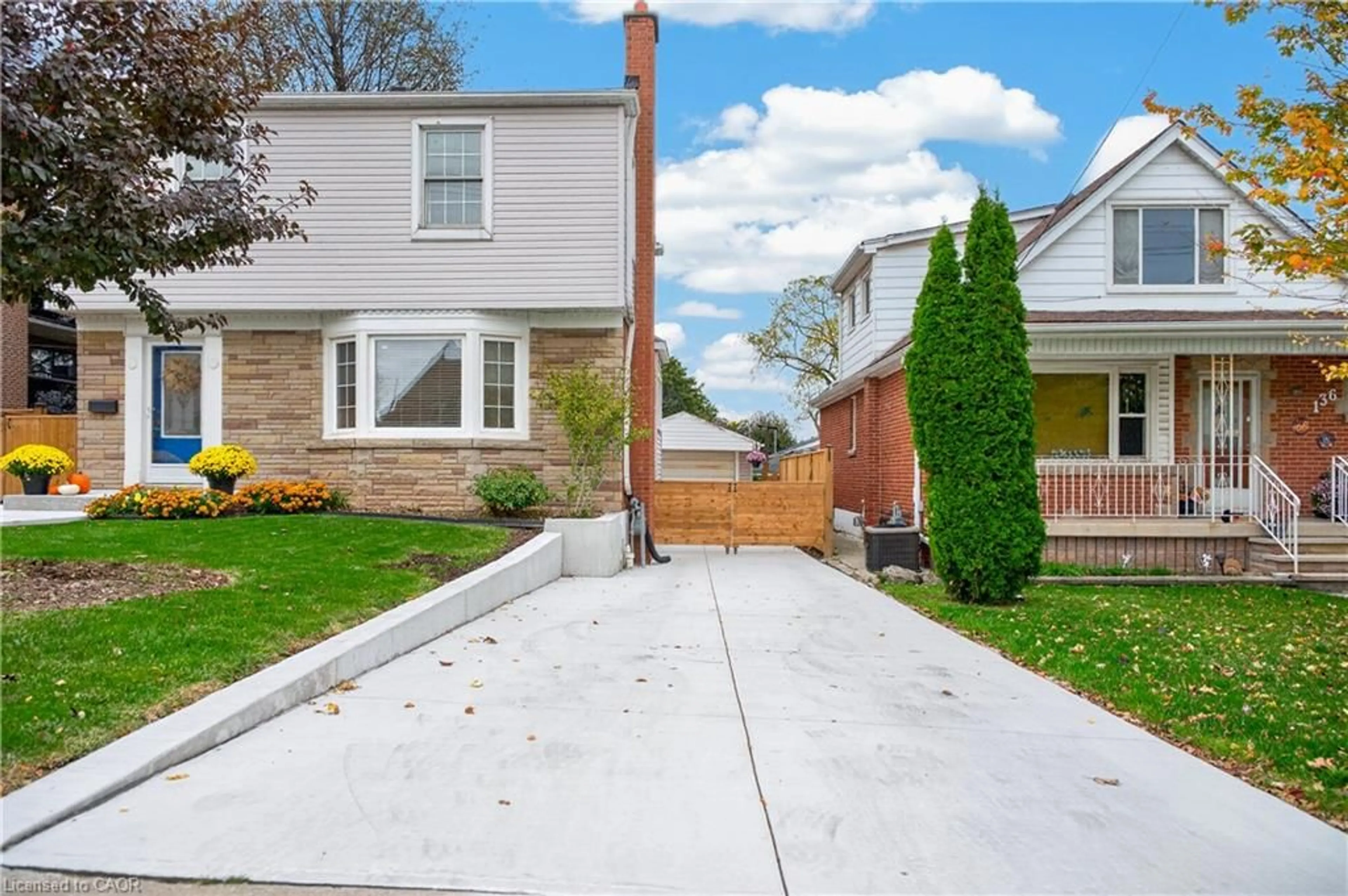 Home with brick exterior material, street for 138 Cameron Ave, Hamilton Ontario L8K 2X7