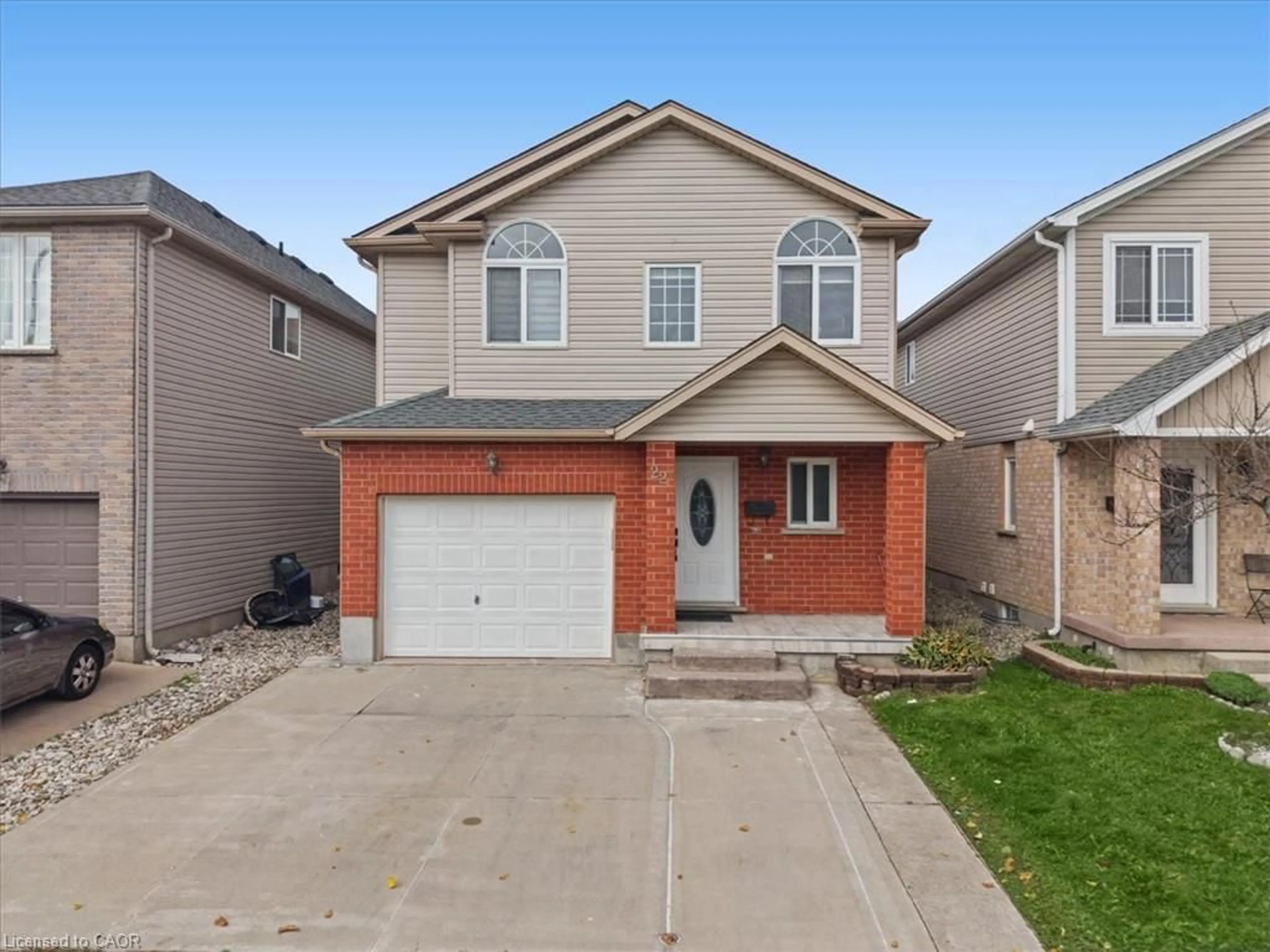 Home with brick exterior material, street for 22 Indigo St, Kitchener Ontario N2E 4E8