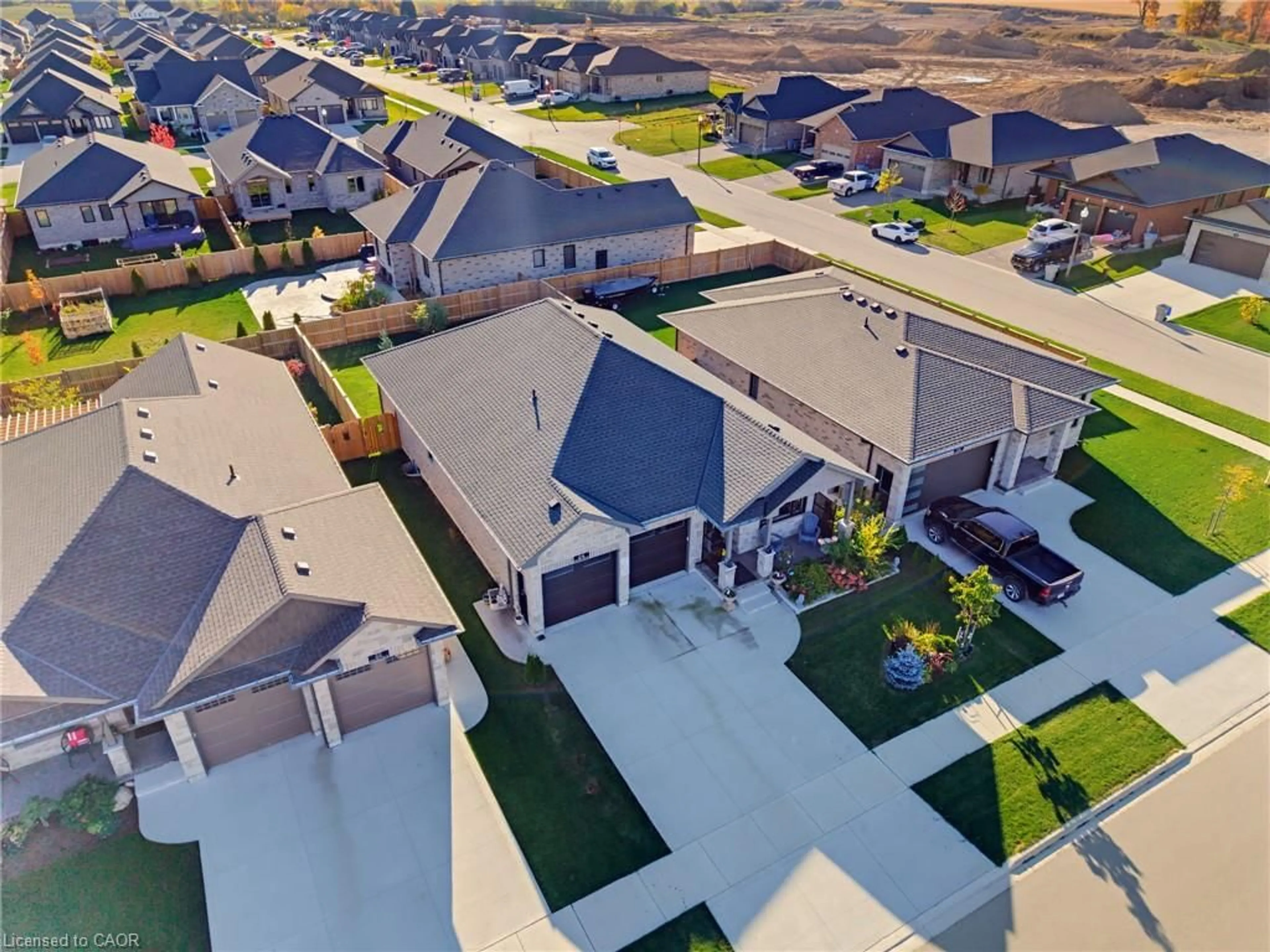A pic from outside/outdoor area/front of a property/back of a property/a pic from drone, street for 24 Winchester Cres, Listowel Ontario N4W 0J8