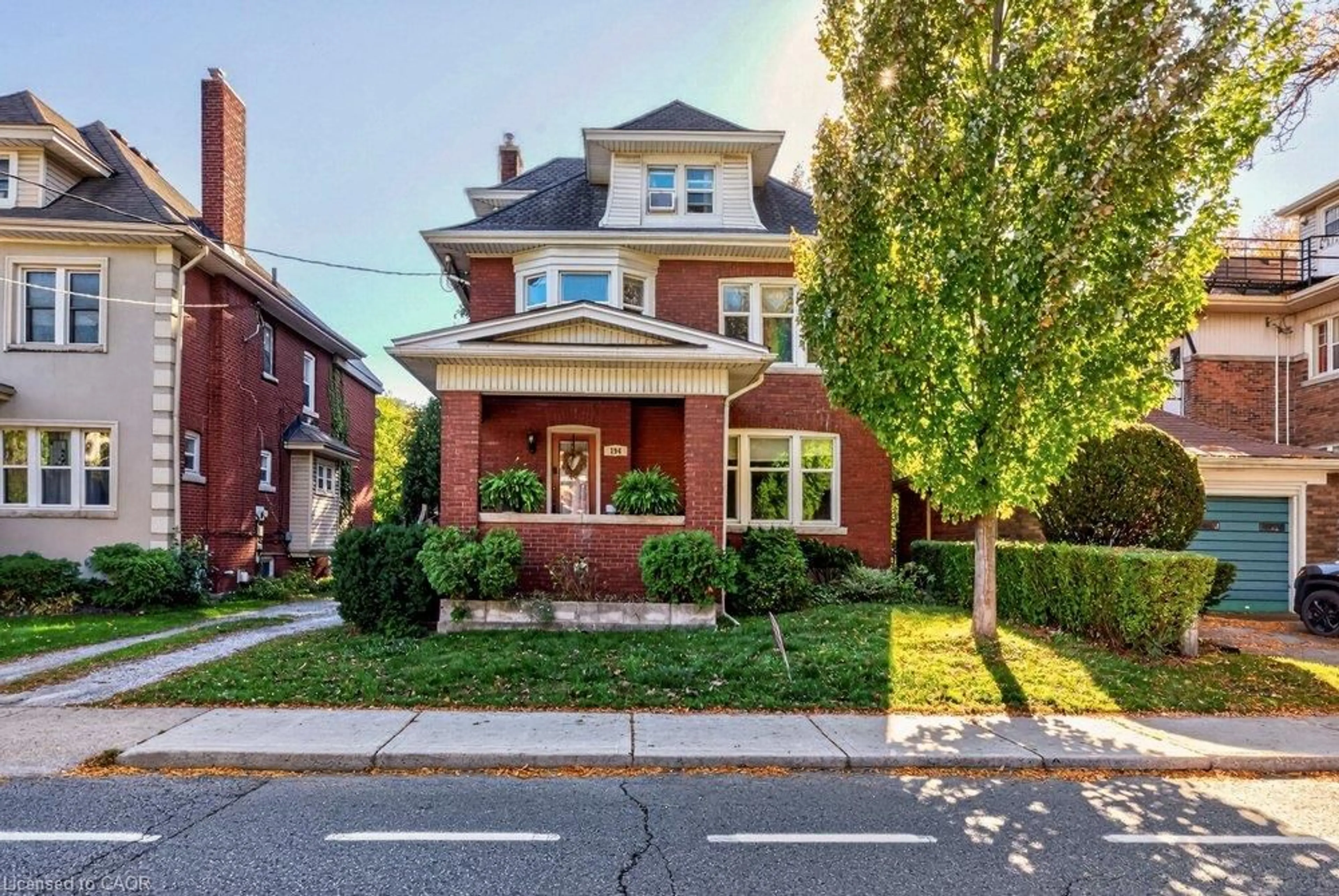 Home with brick exterior material, street for 194 Delaware Ave, Hamilton Ontario L8M 1W1