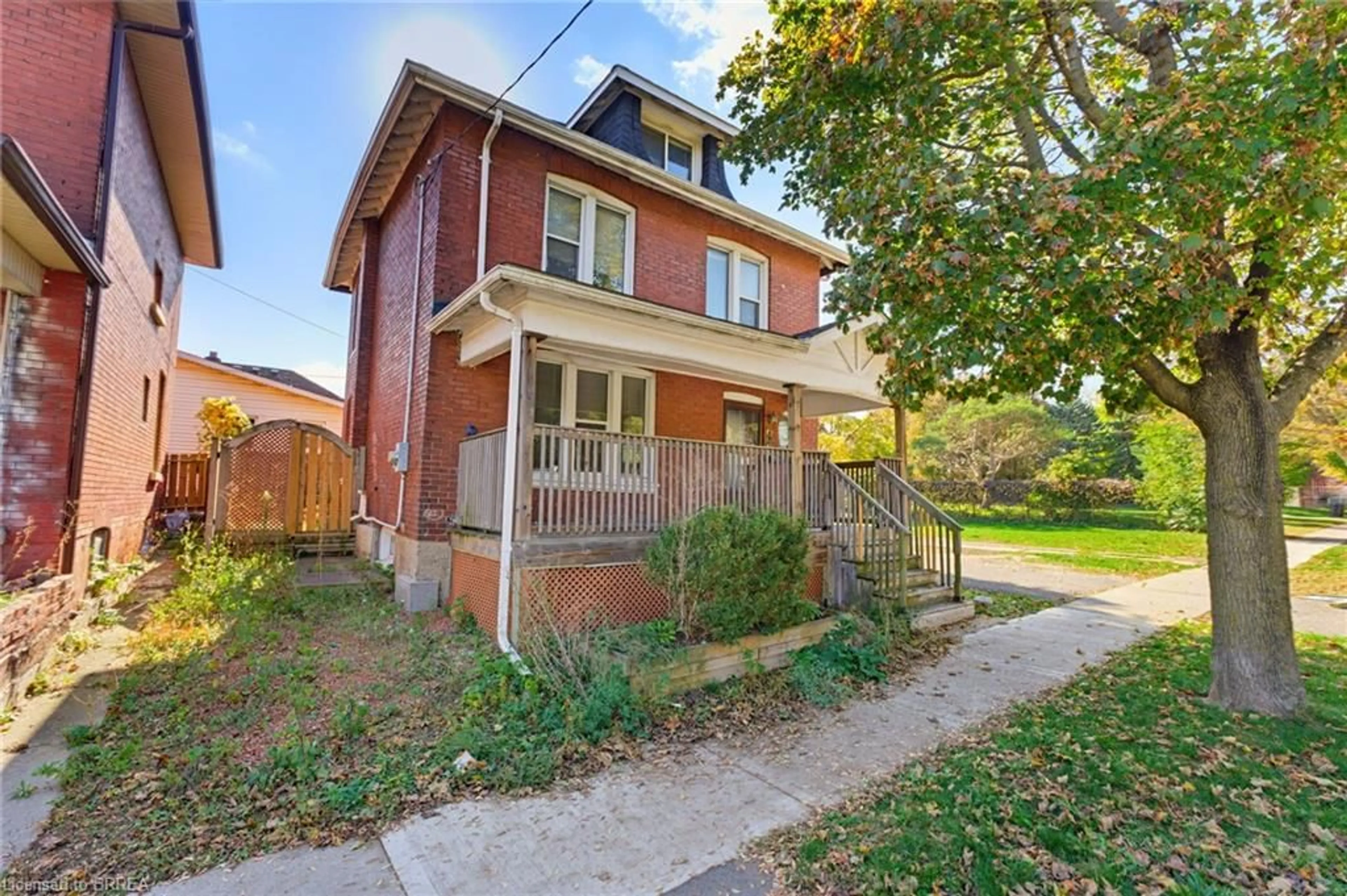 Home with brick exterior material, street for 47 Grey St, Brantford Ontario N3T 2T1