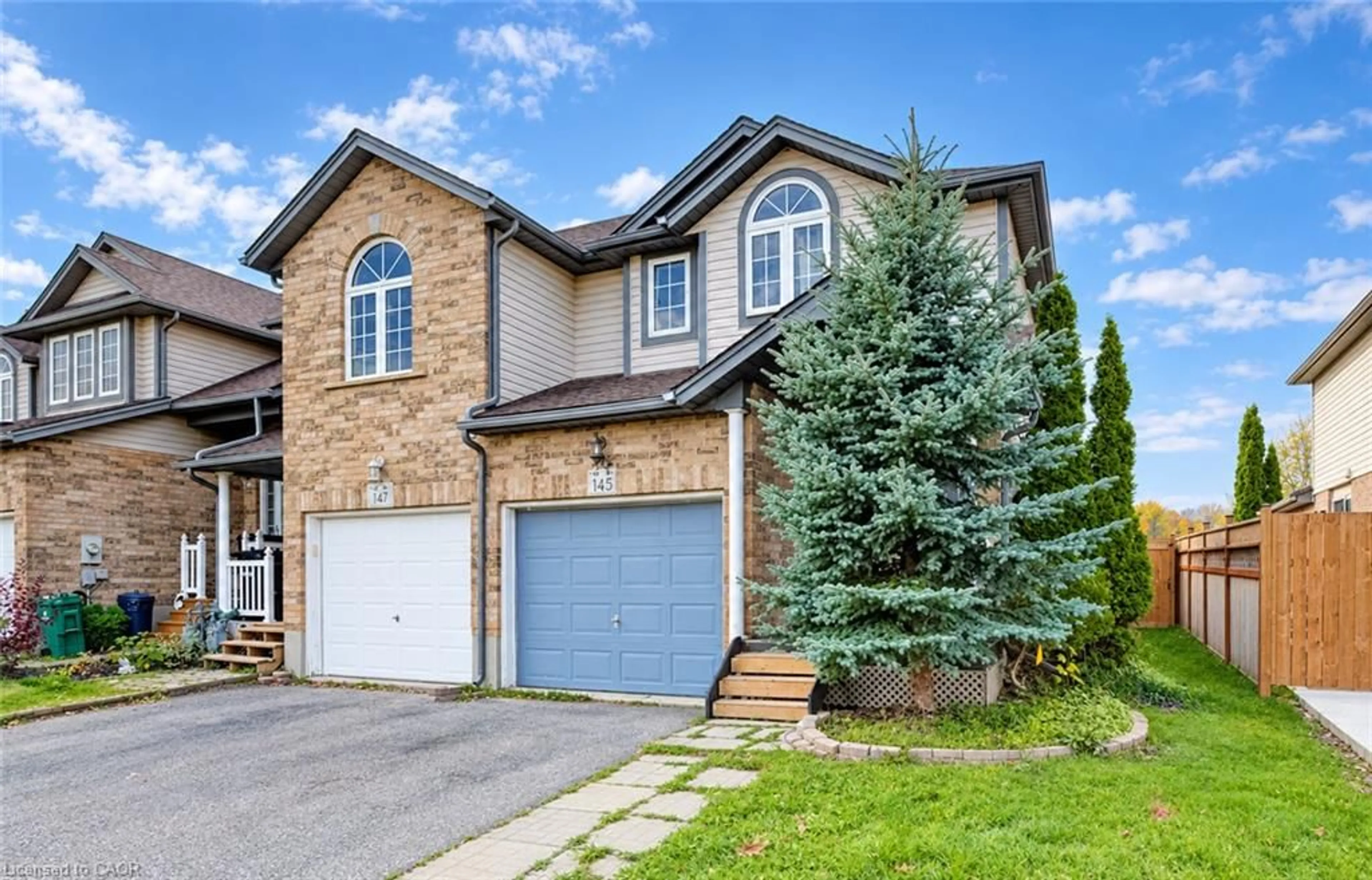 Home with brick exterior material, street for 145 Activa Ave, Kitchener Ontario N2E 3T3