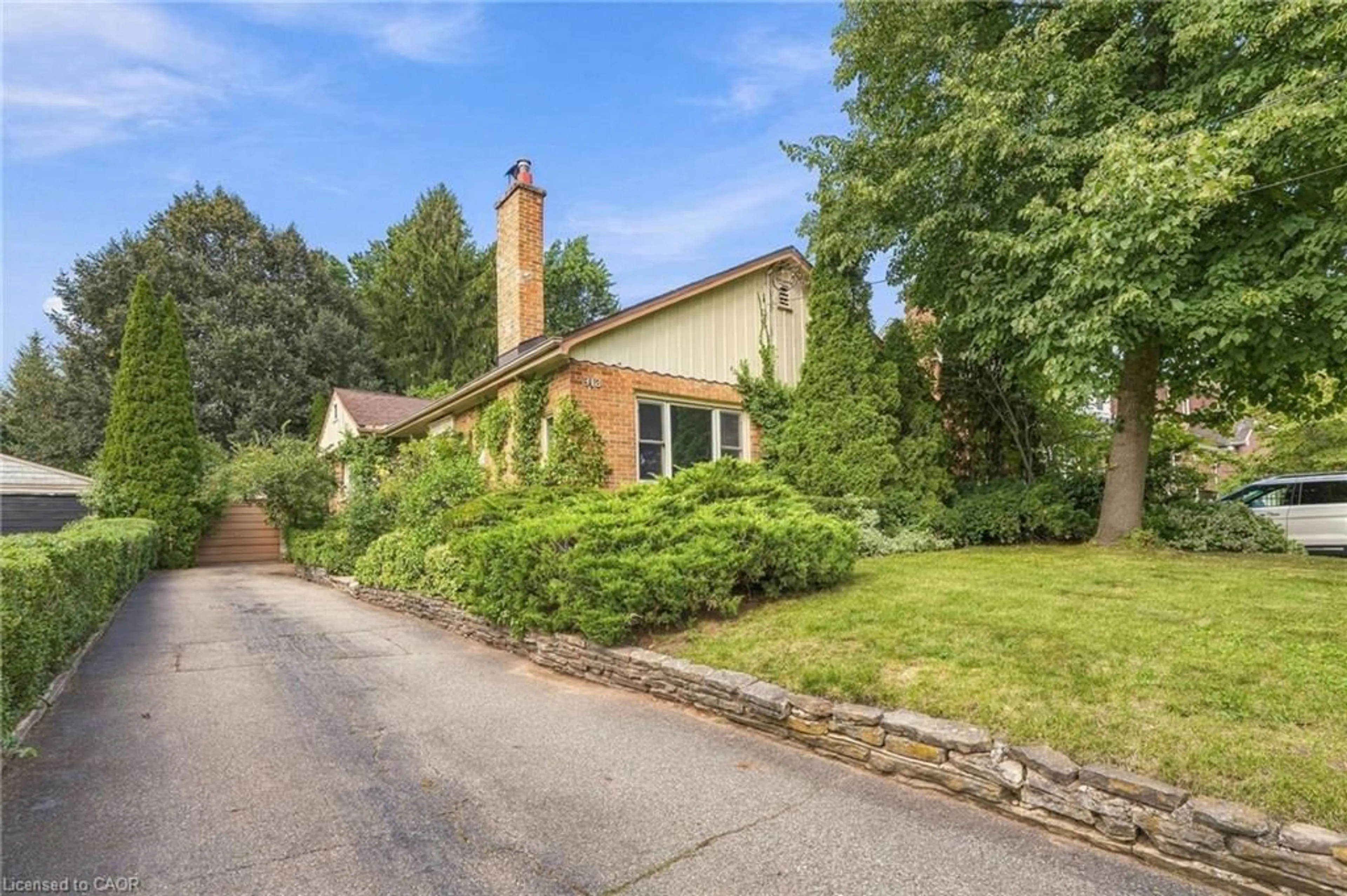 Home with brick exterior material, street for 313 North Shore Blvd, Burlington Ontario L7T 1A6