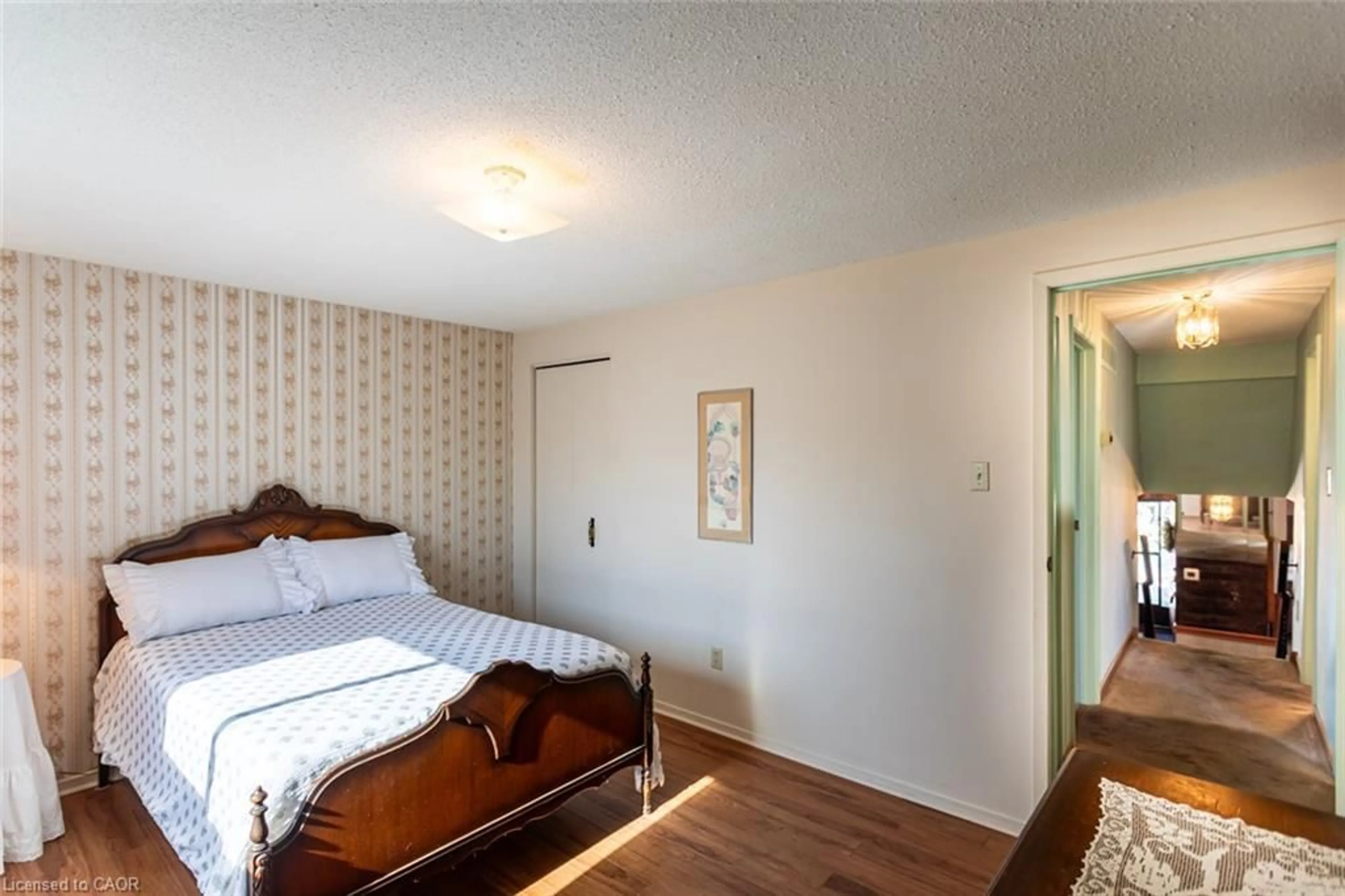 Bedroom with bed, wood/laminate floor for 2412 Brasilia Cir, Mississauga Ontario L5N 2G1