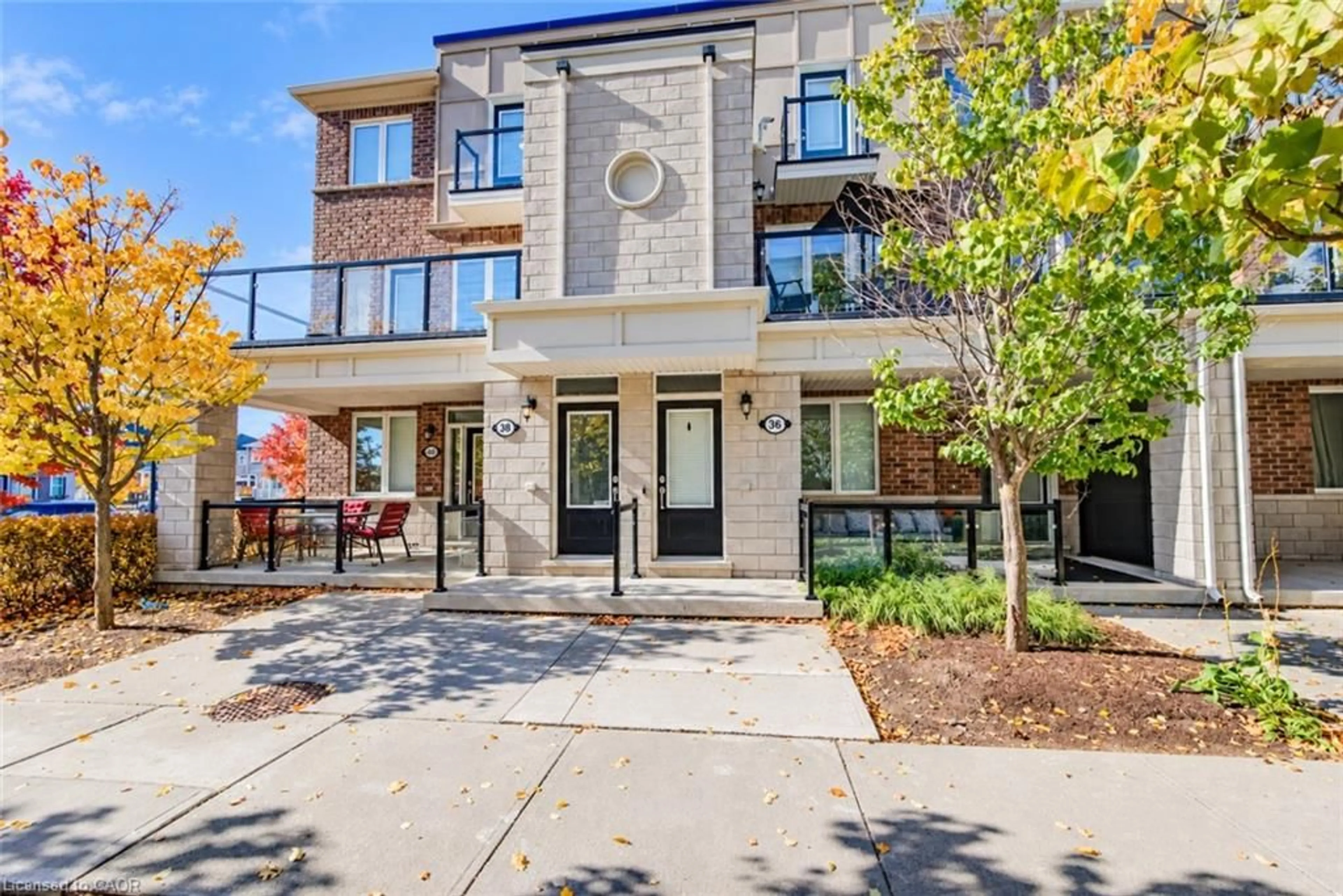 Home with brick exterior material, street for 38 Daylily Lane, Kitchener Ontario N2R 0K1