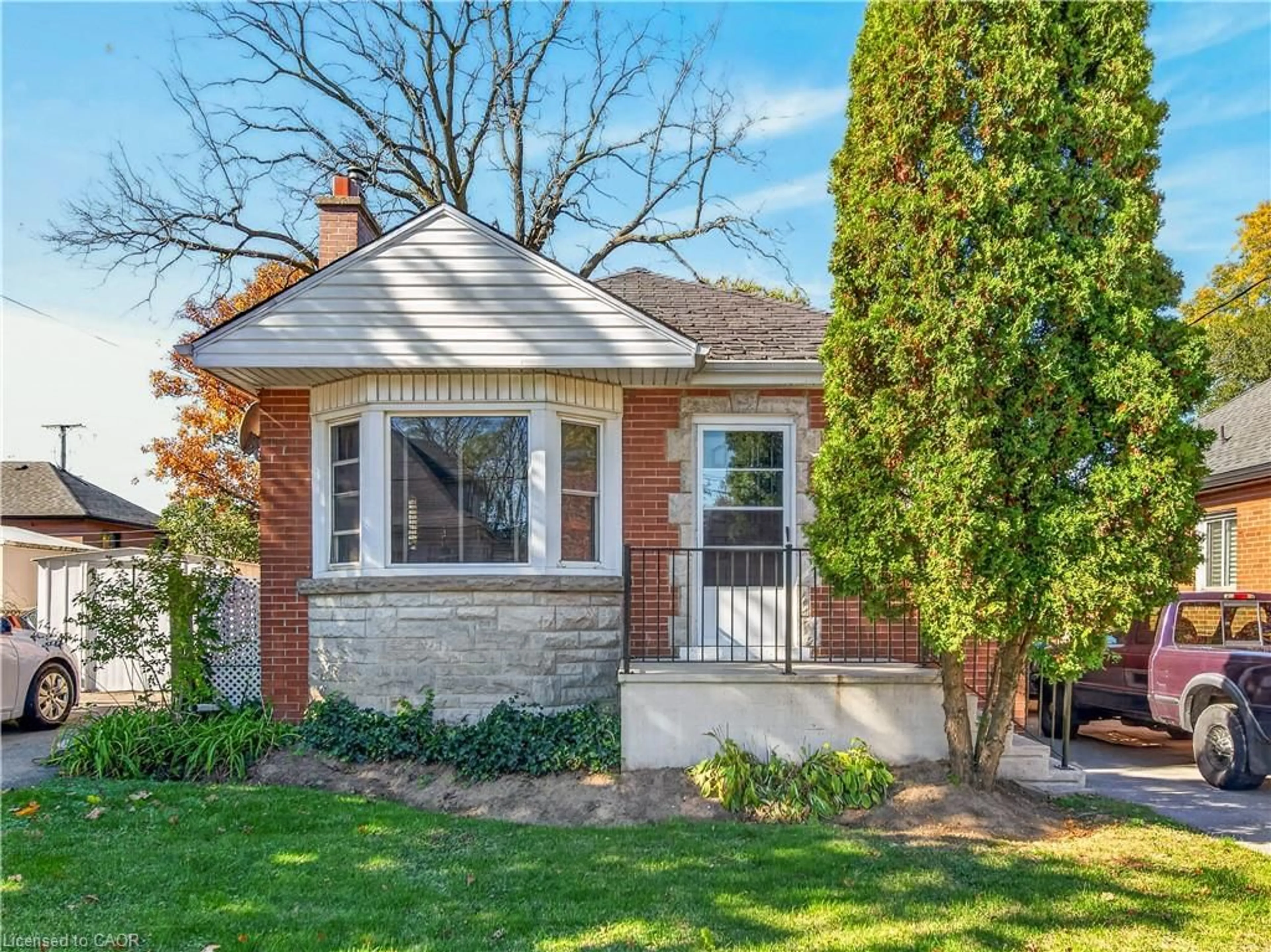 Home with brick exterior material, street for 304 East 19th St, Hamilton Ontario L9A 4S7