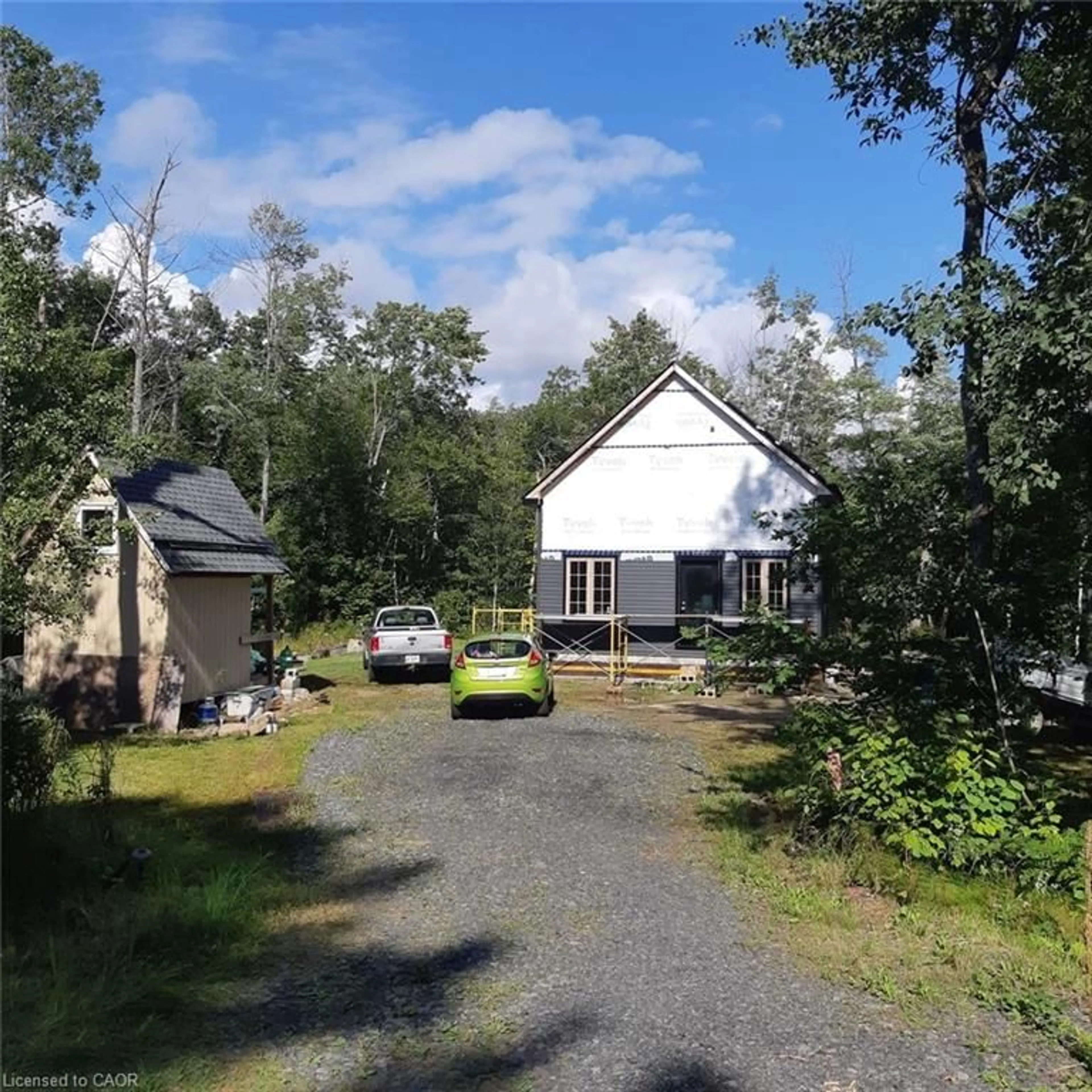 A pic from outside/outdoor area/front of a property/back of a property/a pic from drone, street for 10 Ginn-Beach Dr, The Archipelago Ontario P0G 1G0