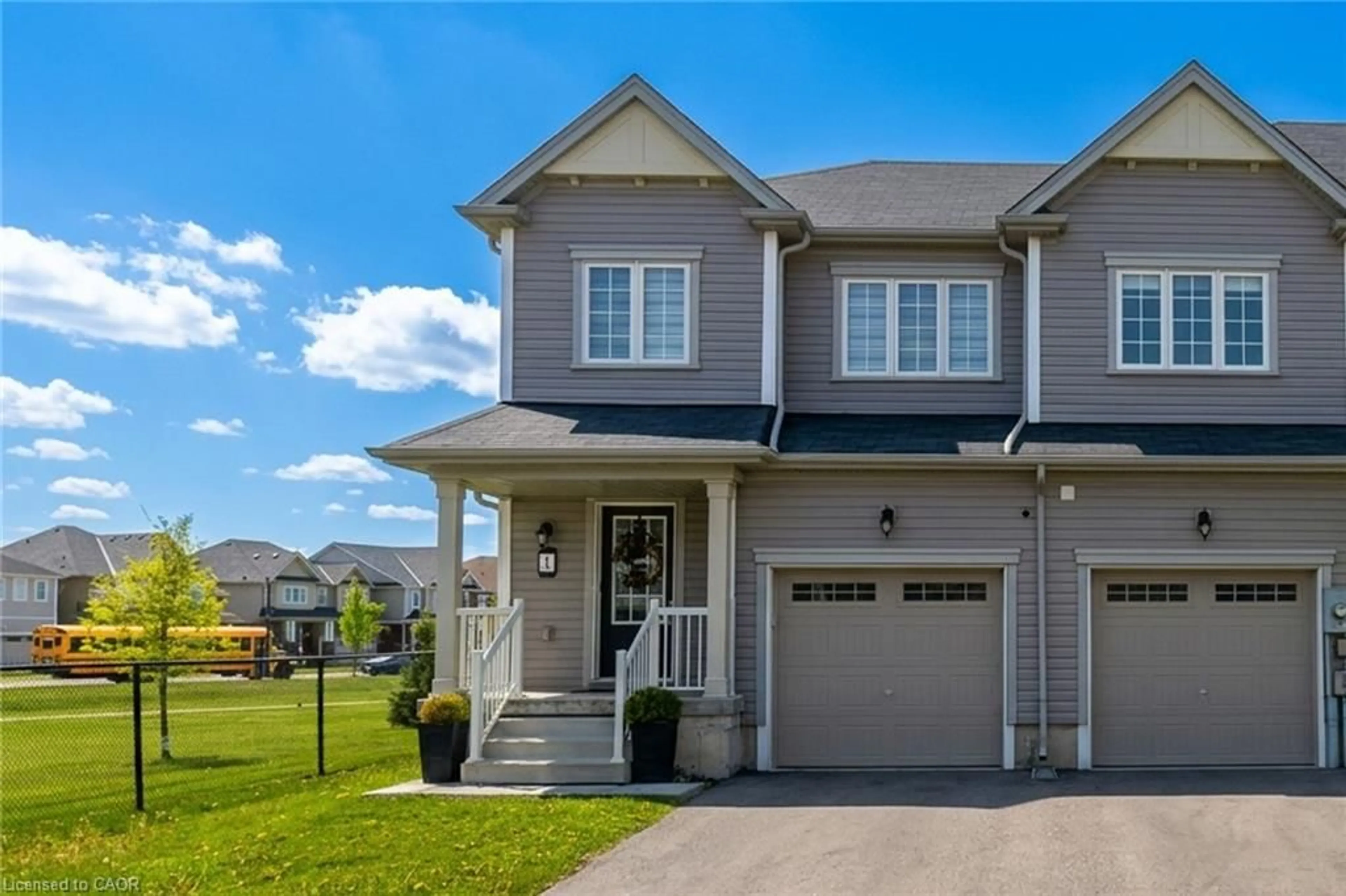 Home with vinyl exterior material, street for 1 Cooke Ave, Brantford Ontario N3T 0S2