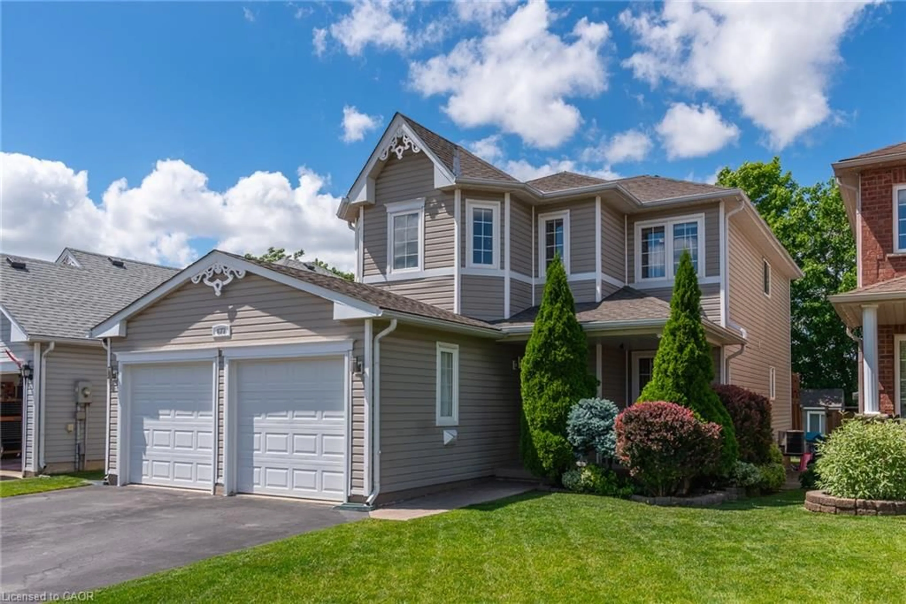 Home with vinyl exterior material, street for 677 Langlaw Dr, Cambridge Ontario N1P 1H4