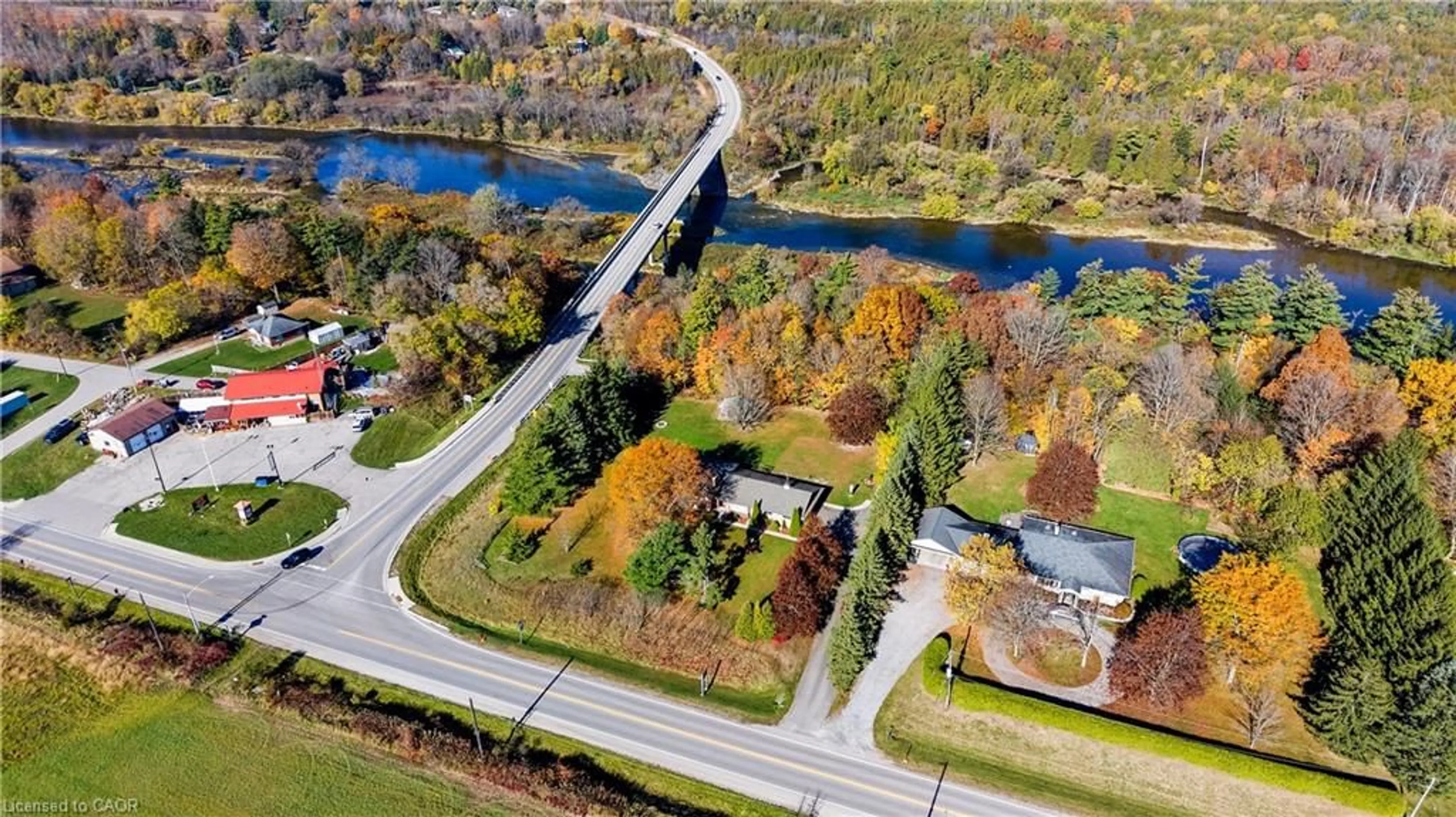 A pic from outside/outdoor area/front of a property/back of a property/a pic from drone, water/lake/river/ocean view for 499 East River Rd, Glen Morris Ontario N0B 1W0