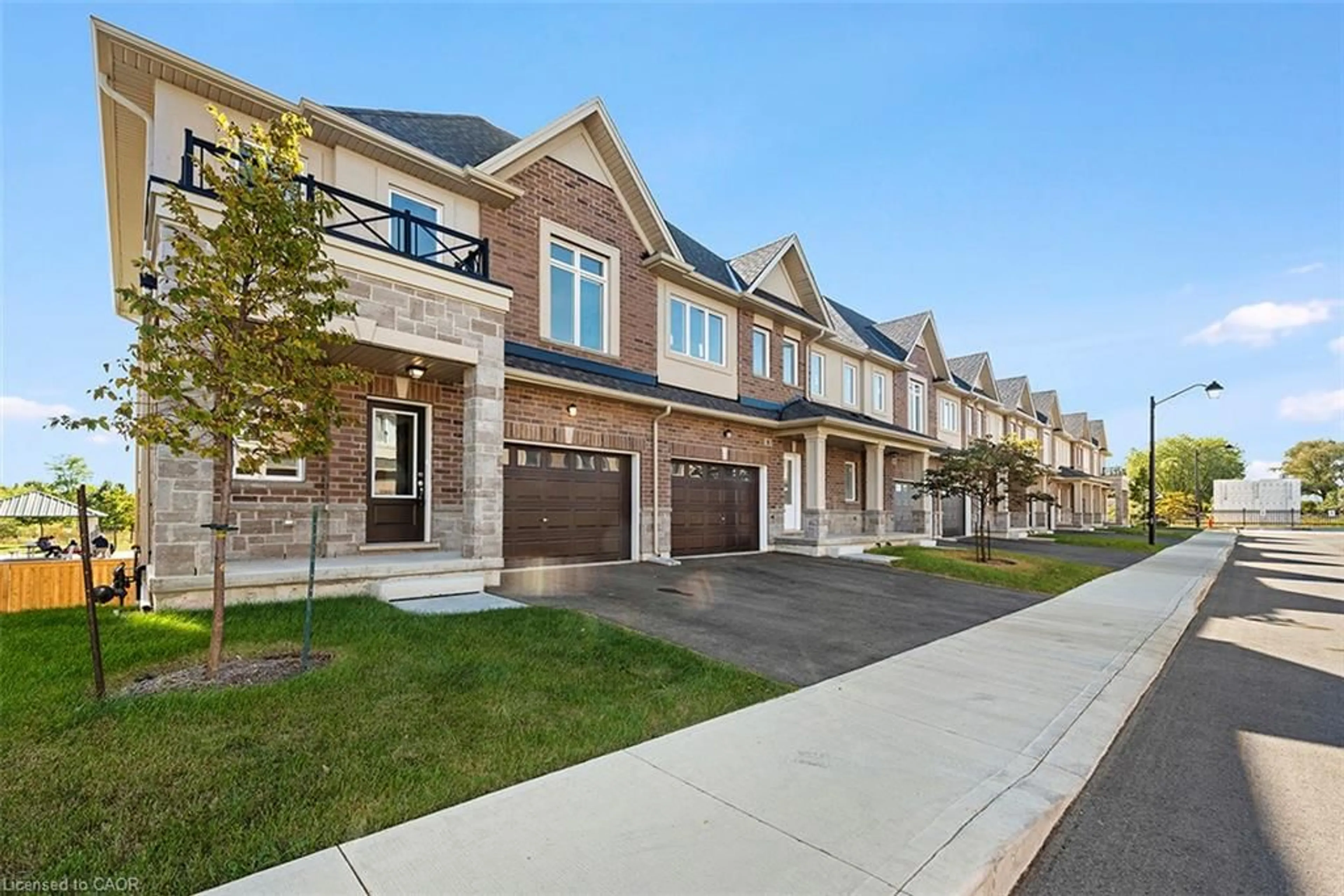 Home with brick exterior material, street for 205 Thames Way #7, Mount Hope Ontario L0R 1W0