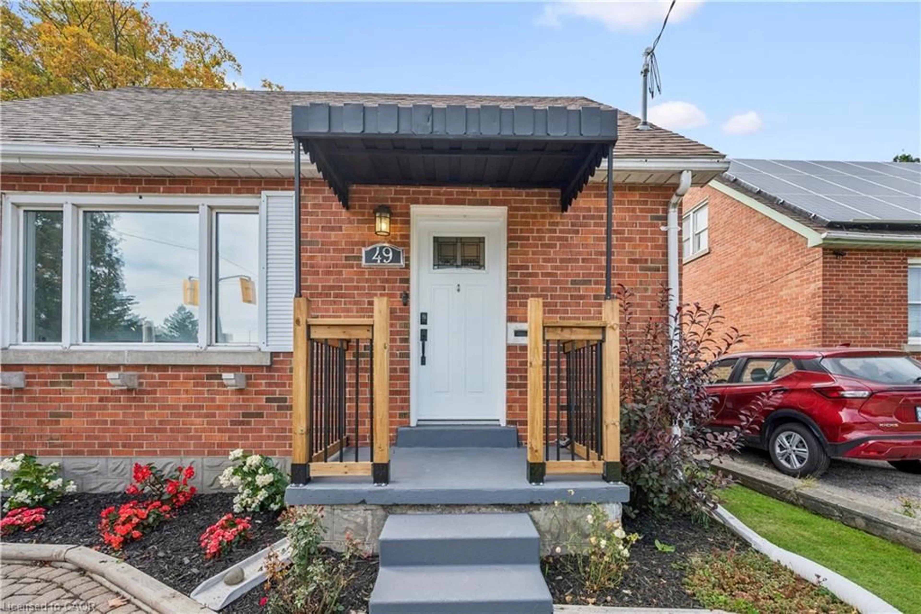 Home with brick exterior material, street for 49 Edna St, Kitchener Ontario N2H 2E2