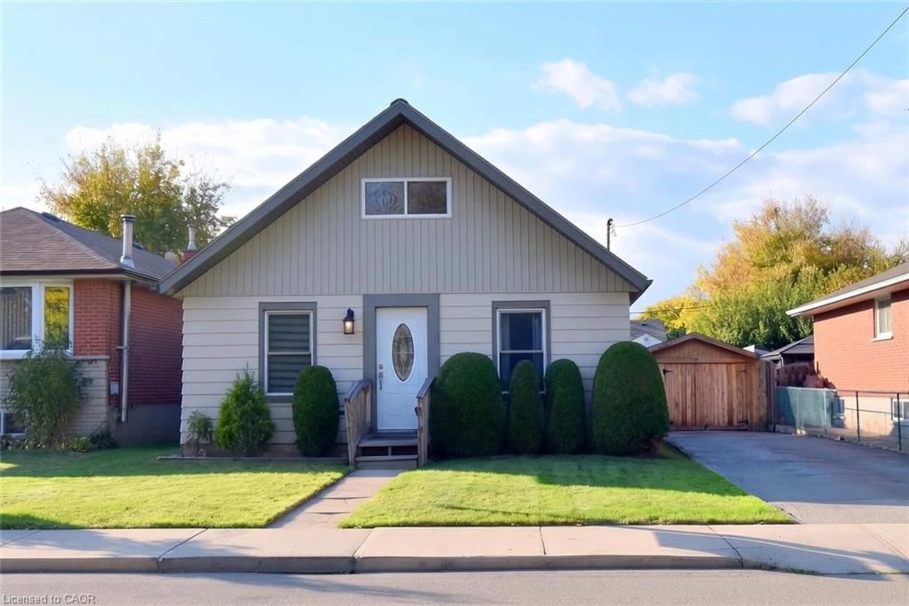 Home with vinyl exterior material, street for 161 Julian Ave, Hamilton Ontario L8H 5R8