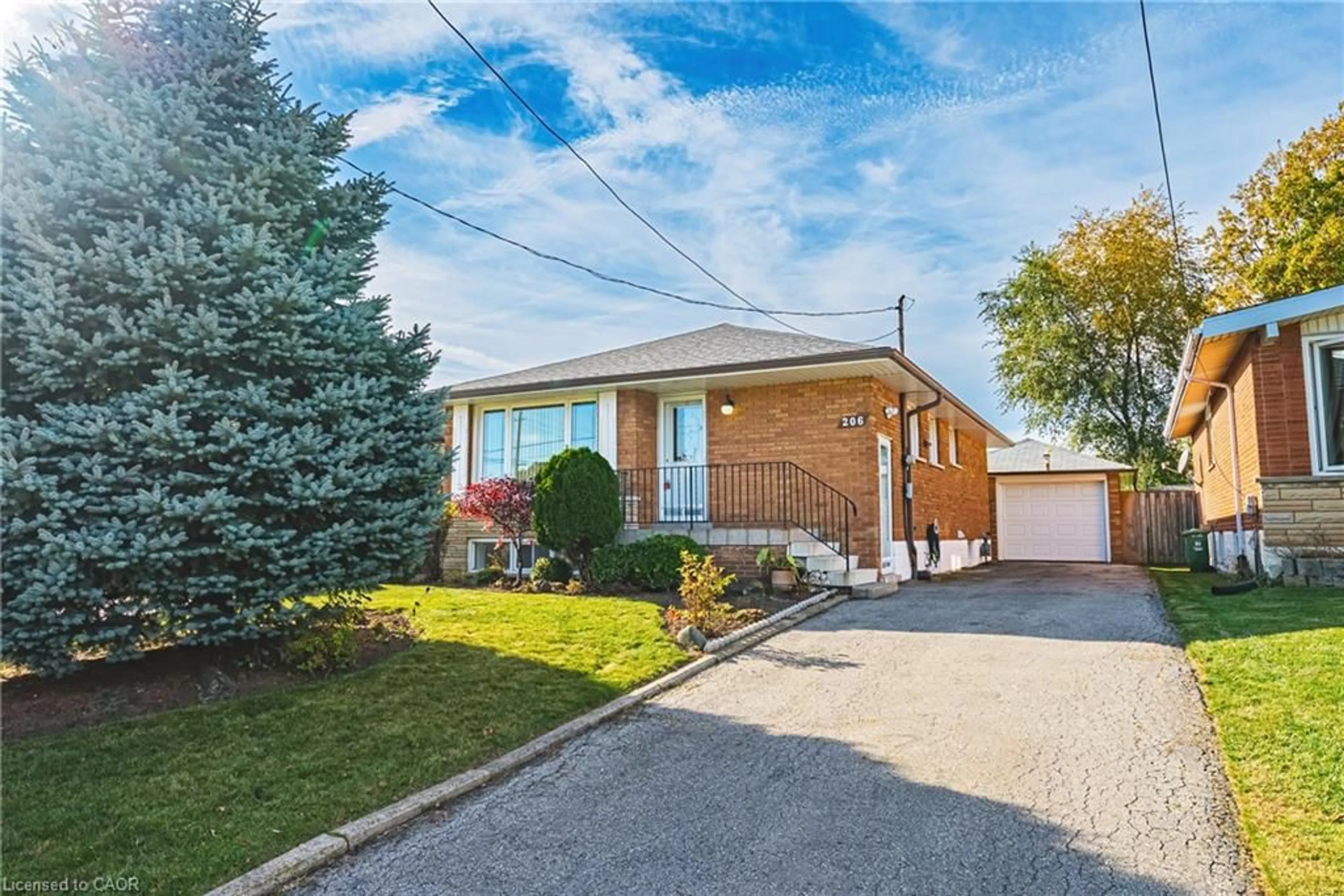 Home with brick exterior material, street for 206 Warren Ave, Hamilton Ontario L9A 3E3