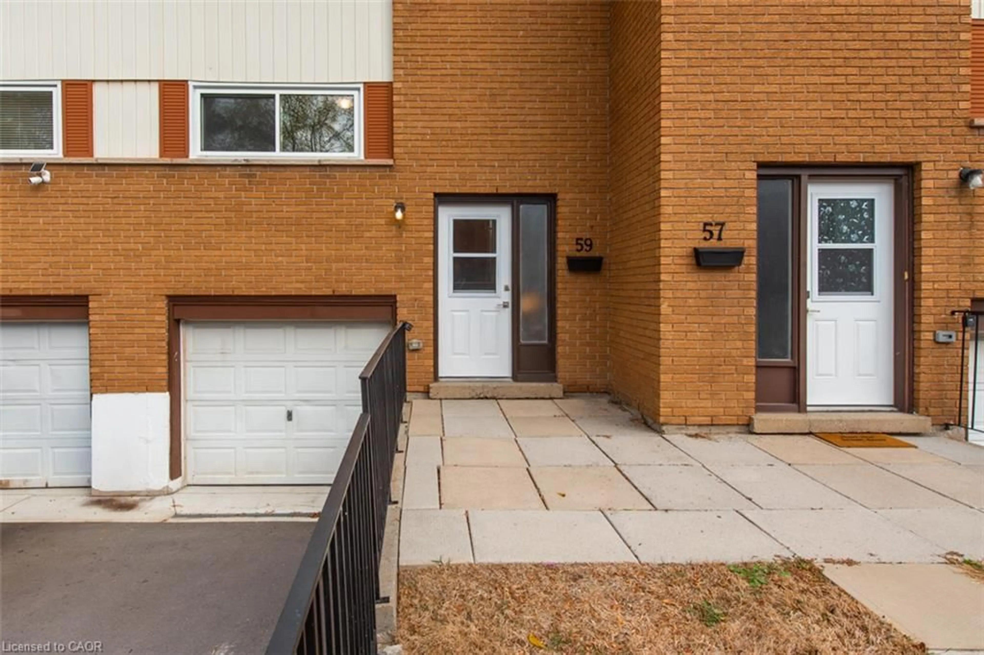 Home with brick exterior material, street for 59 Woodman Dr, Hamilton Ontario L8H 2M5