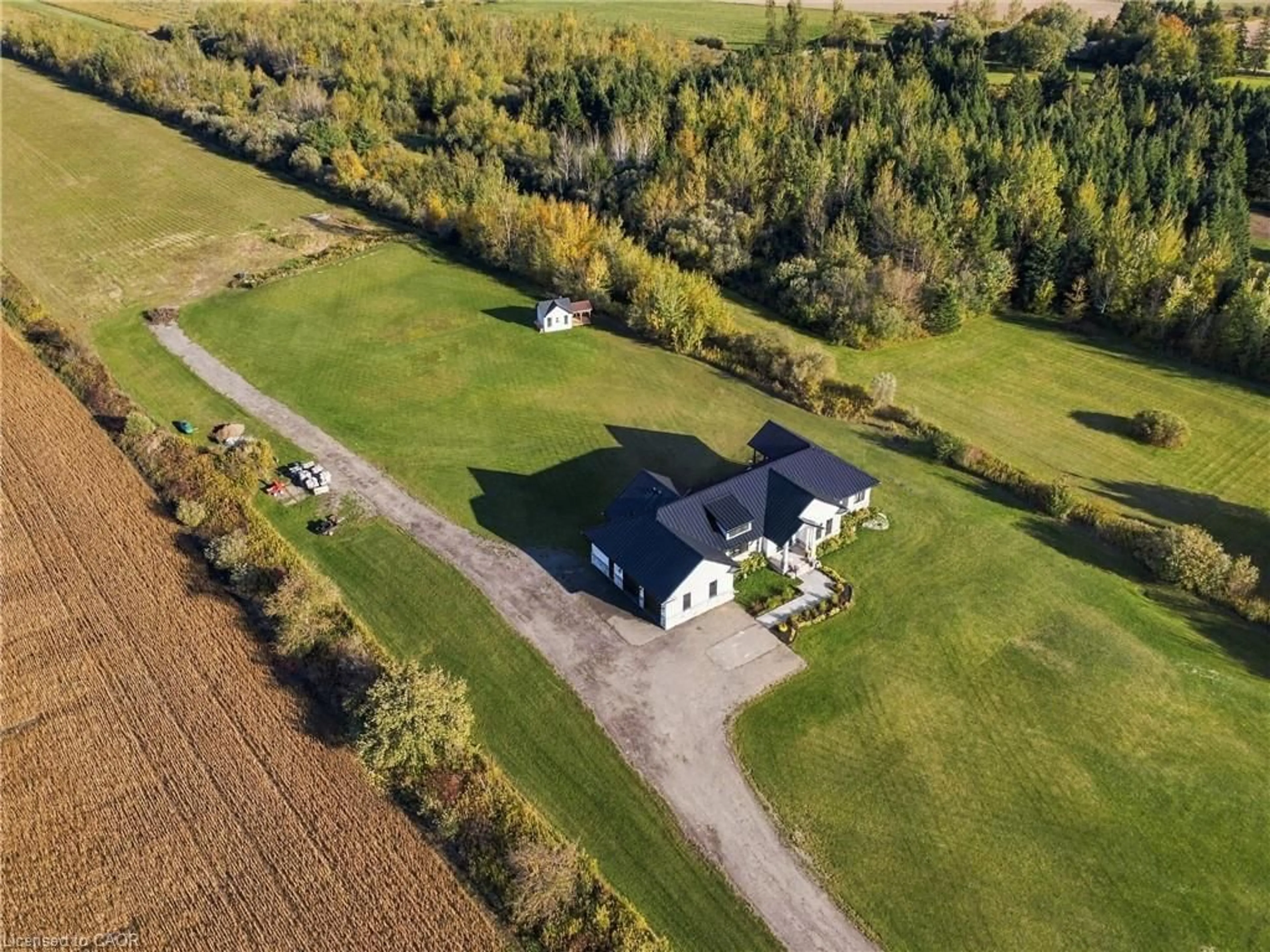 A pic from outside/outdoor area/front of a property/back of a property/a pic from drone, unknown for 373227 6th Line, Amaranth Ontario L9W 0M4