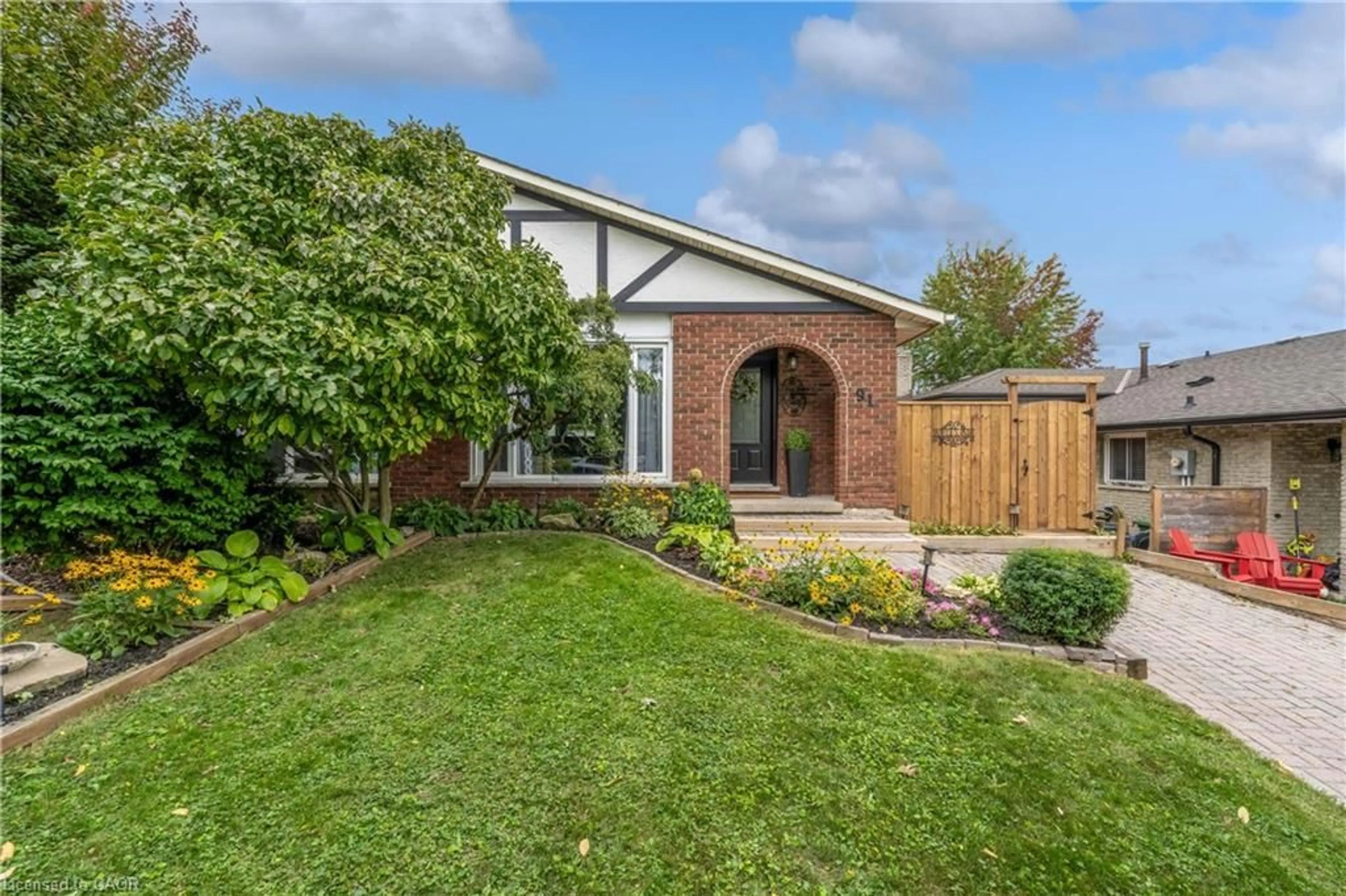 Home with brick exterior material, street for 91 Guildwood Dr, Hamilton Ontario L9C 6S3