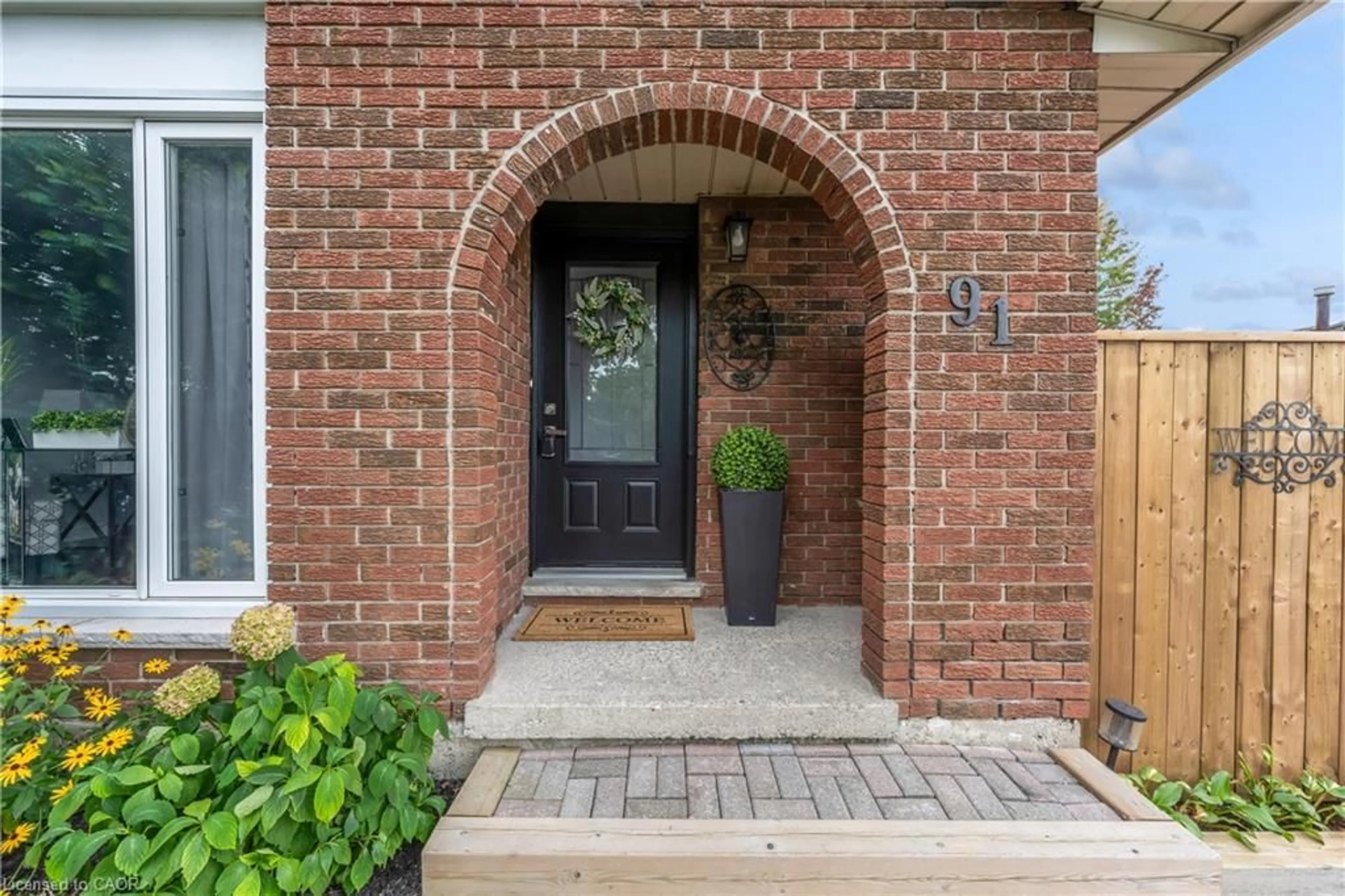Home with brick exterior material, street for 91 Guildwood Dr, Hamilton Ontario L9C 6S3