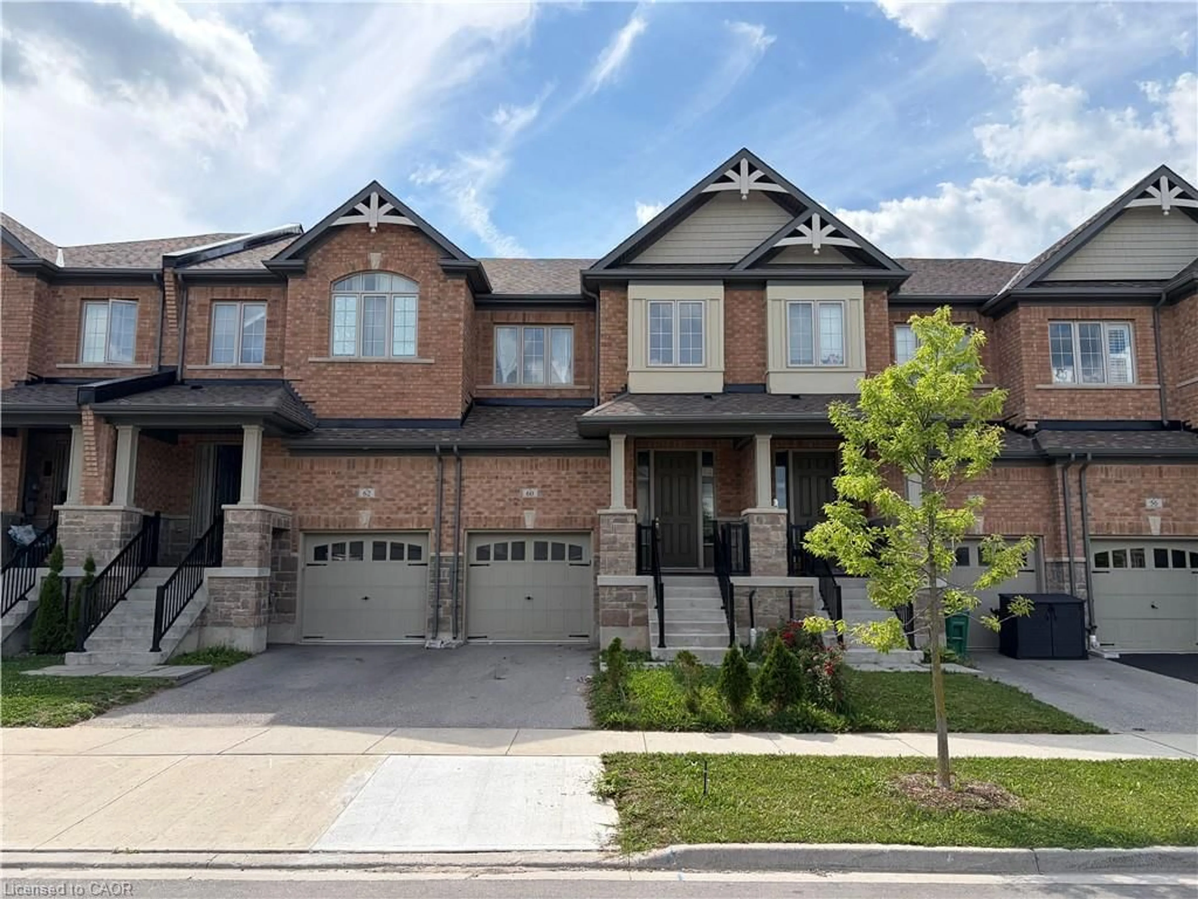 Home with brick exterior material, street for 60 Reistwood Dr, Kitchener Ontario N2P 2L1