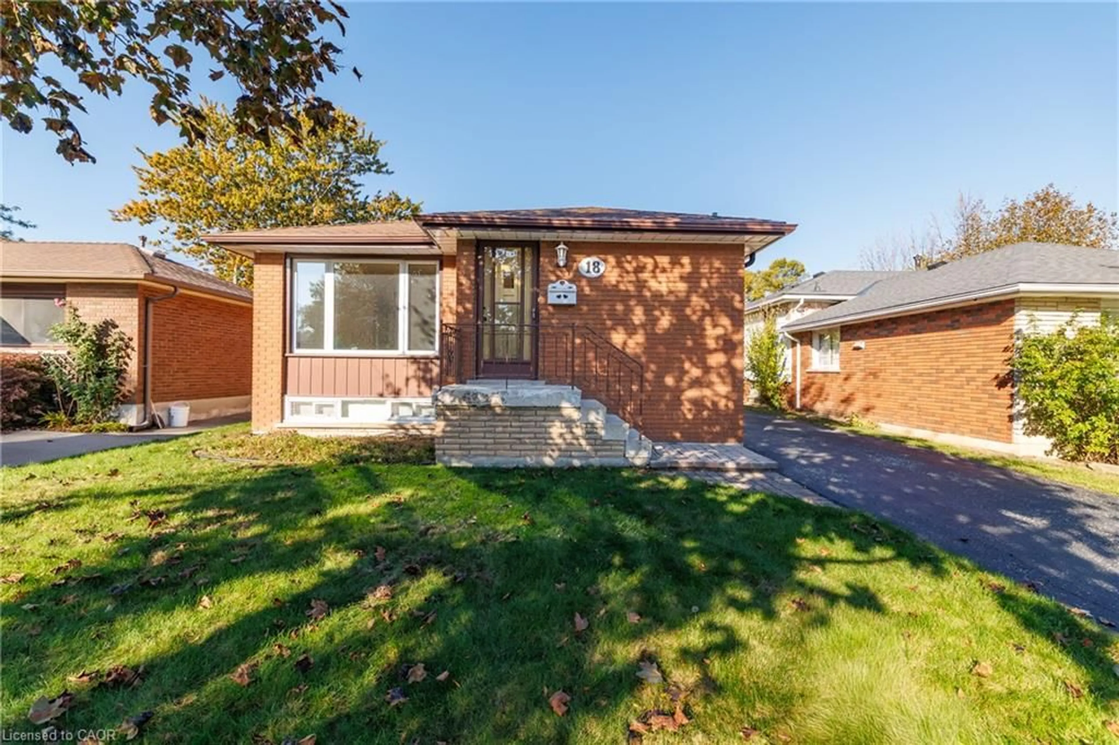 Home with brick exterior material, street for 18 Sycamore St, Hamilton Ontario L8T 3N7