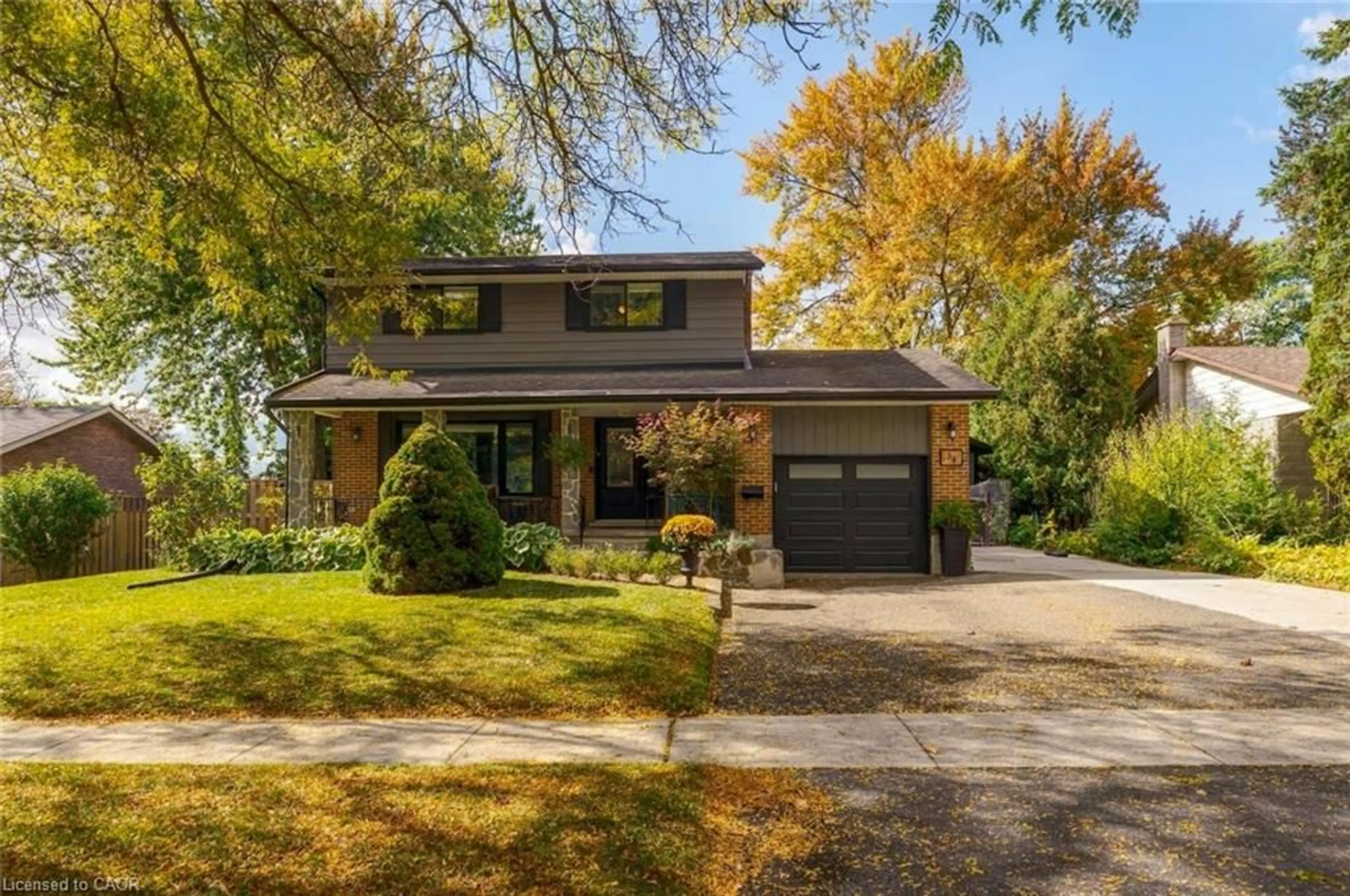Home with brick exterior material, street for 58 Walnut Dr, Guelph Ontario N1E 4B5