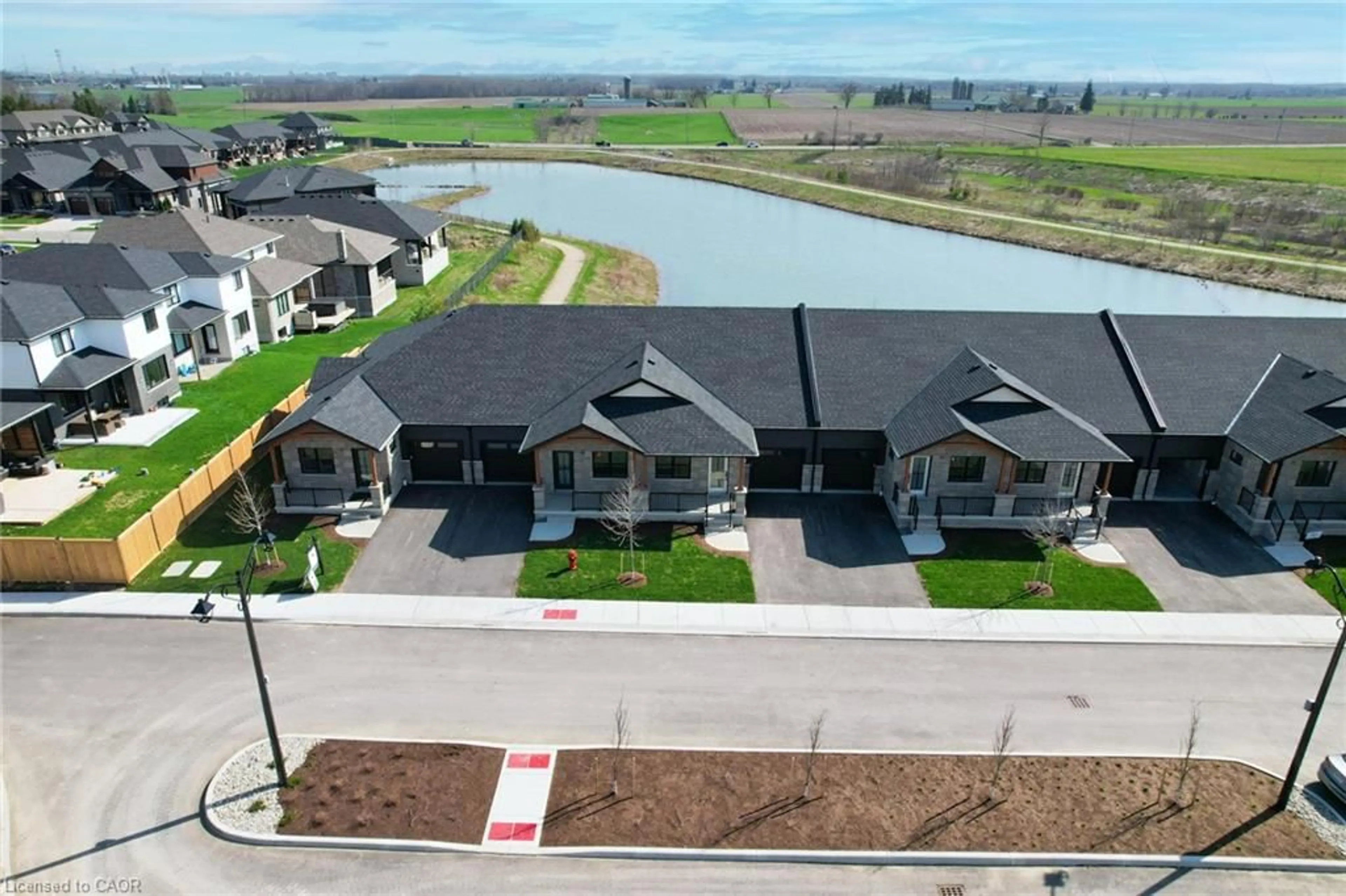 A pic from outside/outdoor area/front of a property/back of a property/a pic from drone, water/lake/river/ocean view for 29 Weymouth St #18, Elmira Ontario N3B 0G3