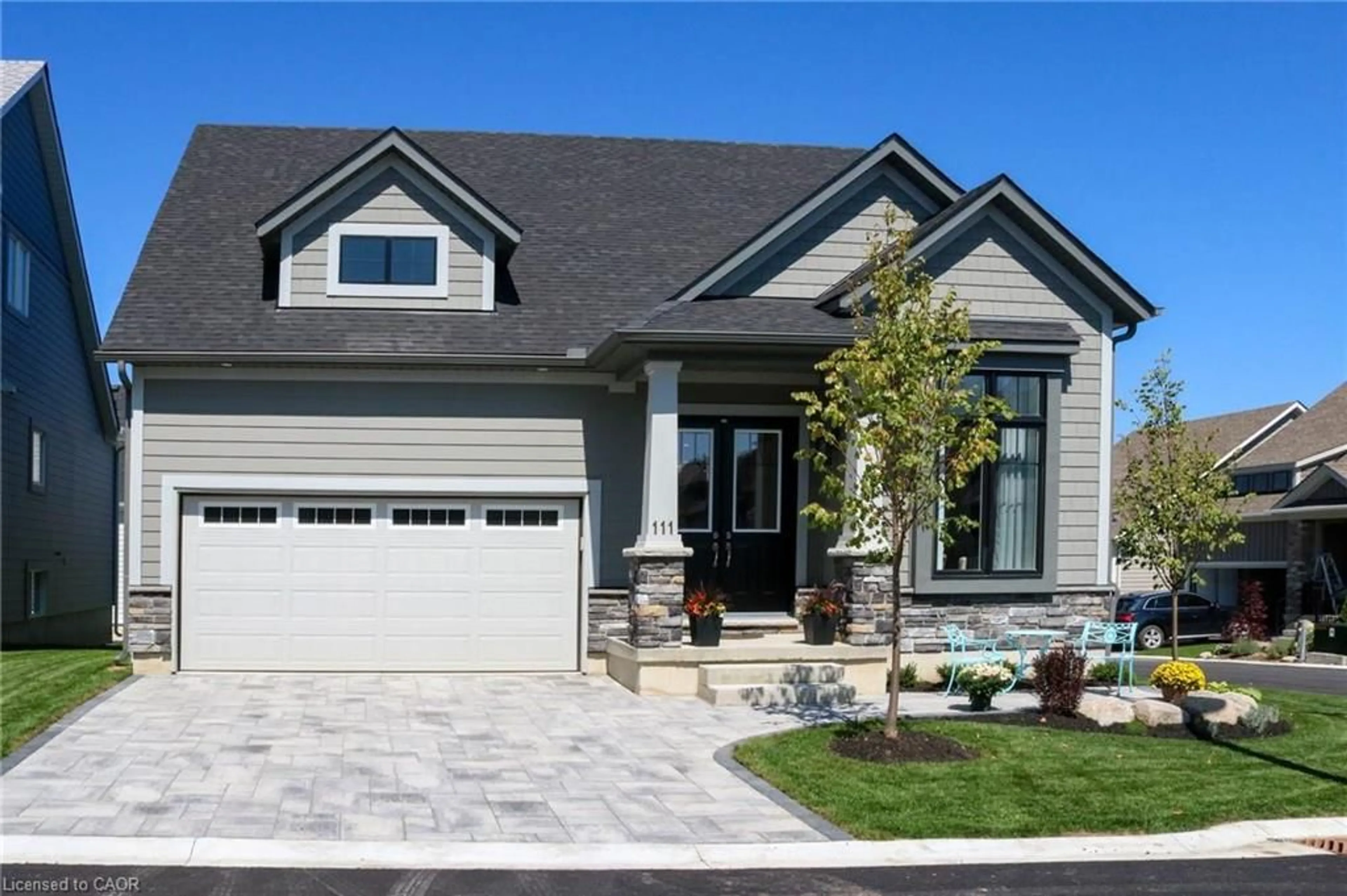 Home with vinyl exterior material, street for 111 Clippers Lane, Thornbury Ontario N0H 2P0