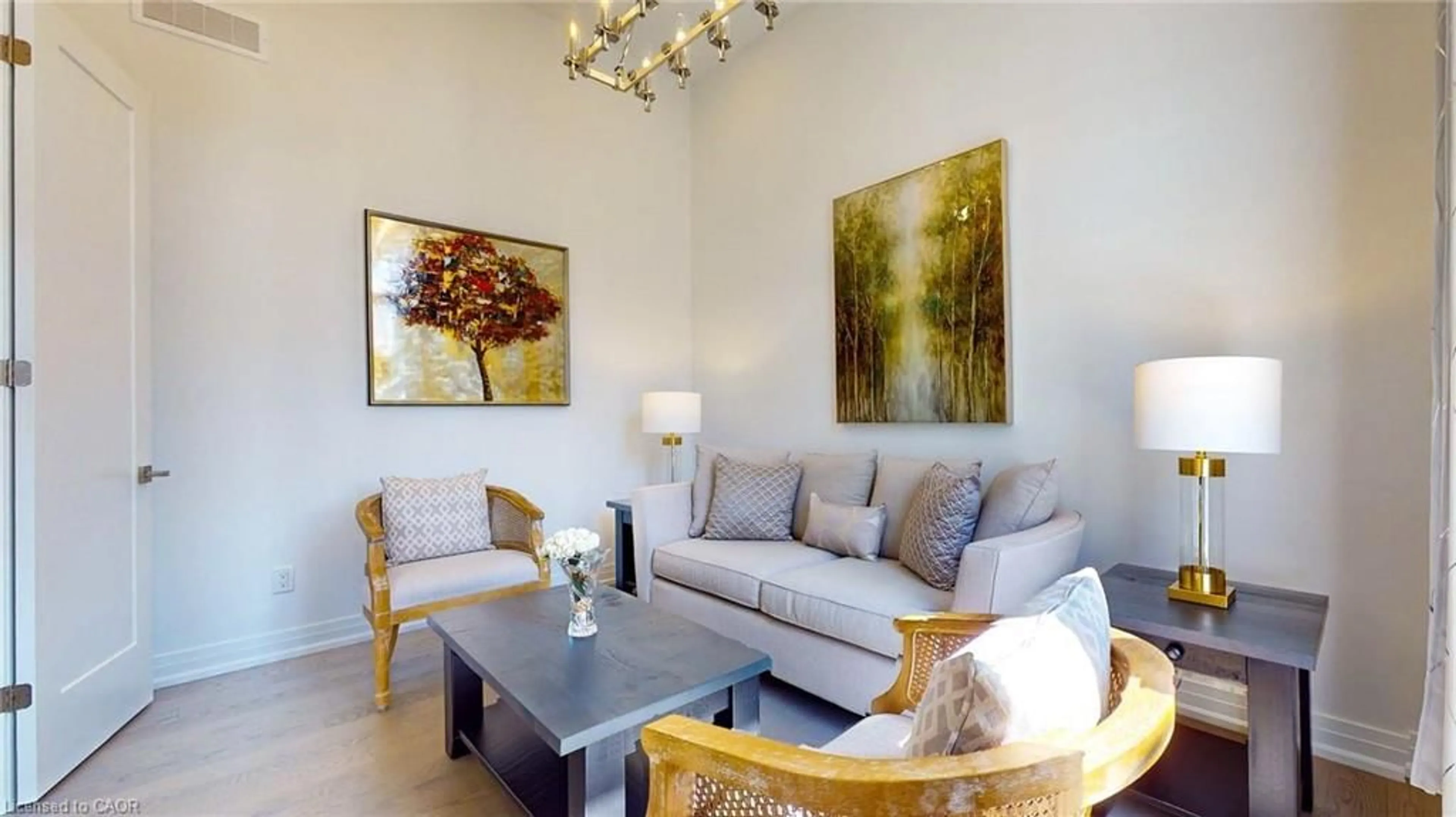 Living room with furniture, wood/laminate floor for 111 Clippers Lane, Thornbury Ontario N0H 2P0