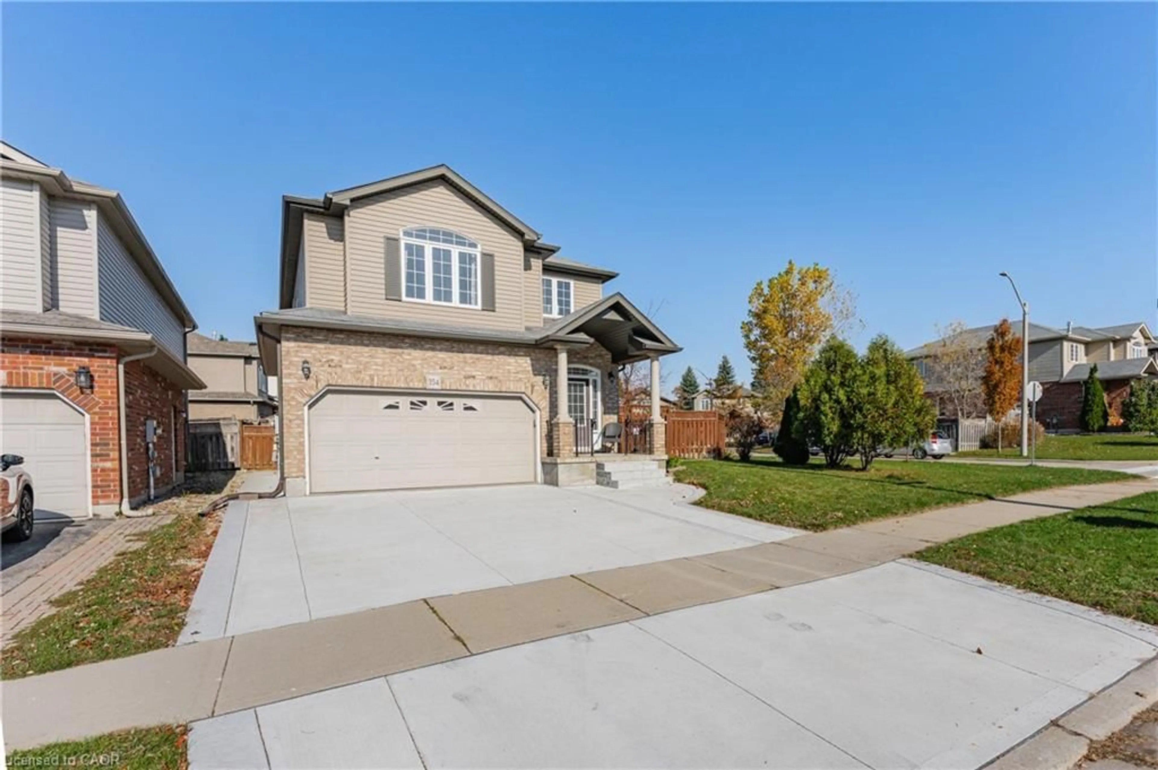 Home with brick exterior material, street for 354 Tealby Cres, Waterloo Ontario N2J 0A1
