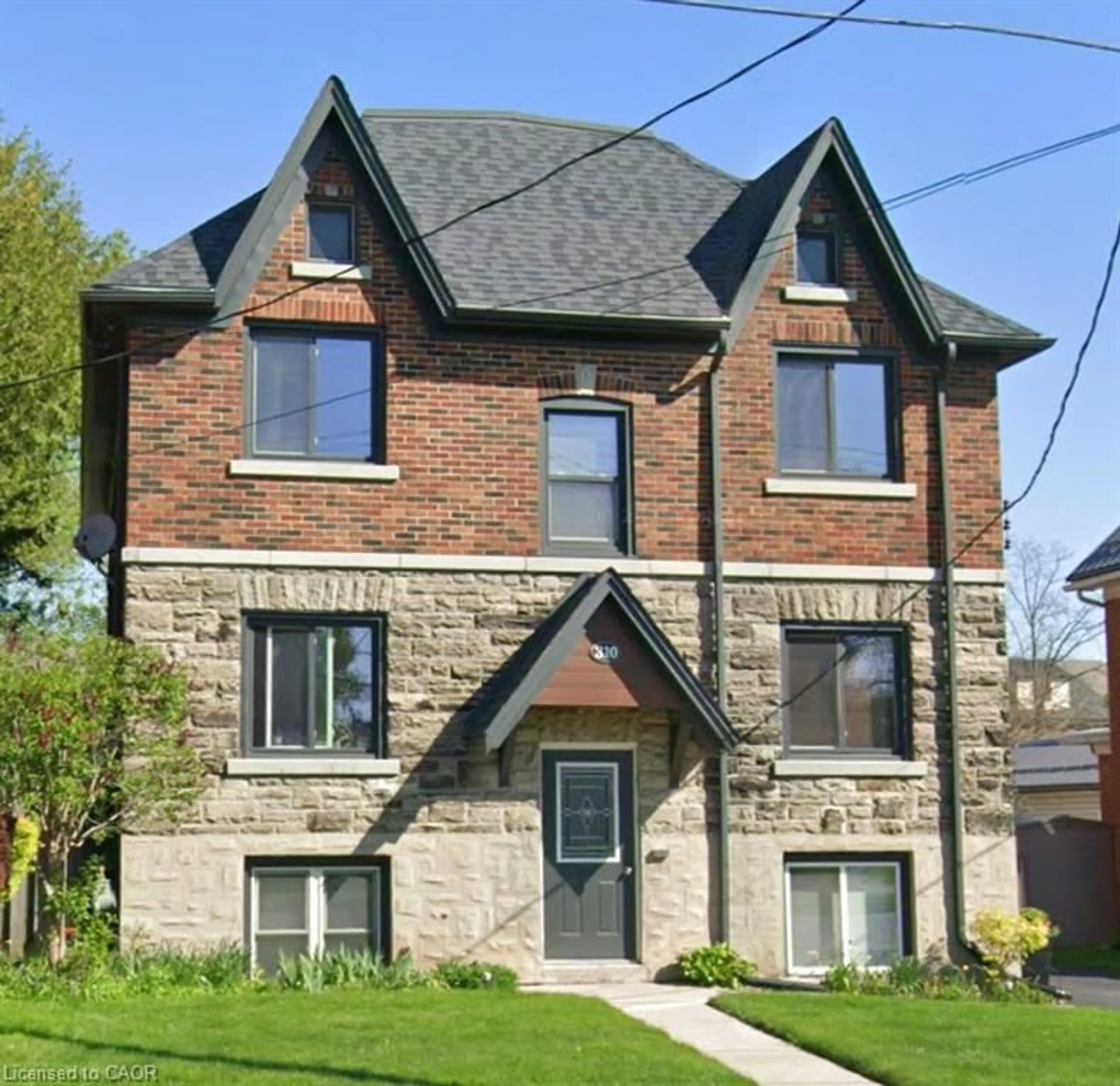 Home with brick exterior material, street for 310 Wellington St, Kitchener Ontario N2H 5K9