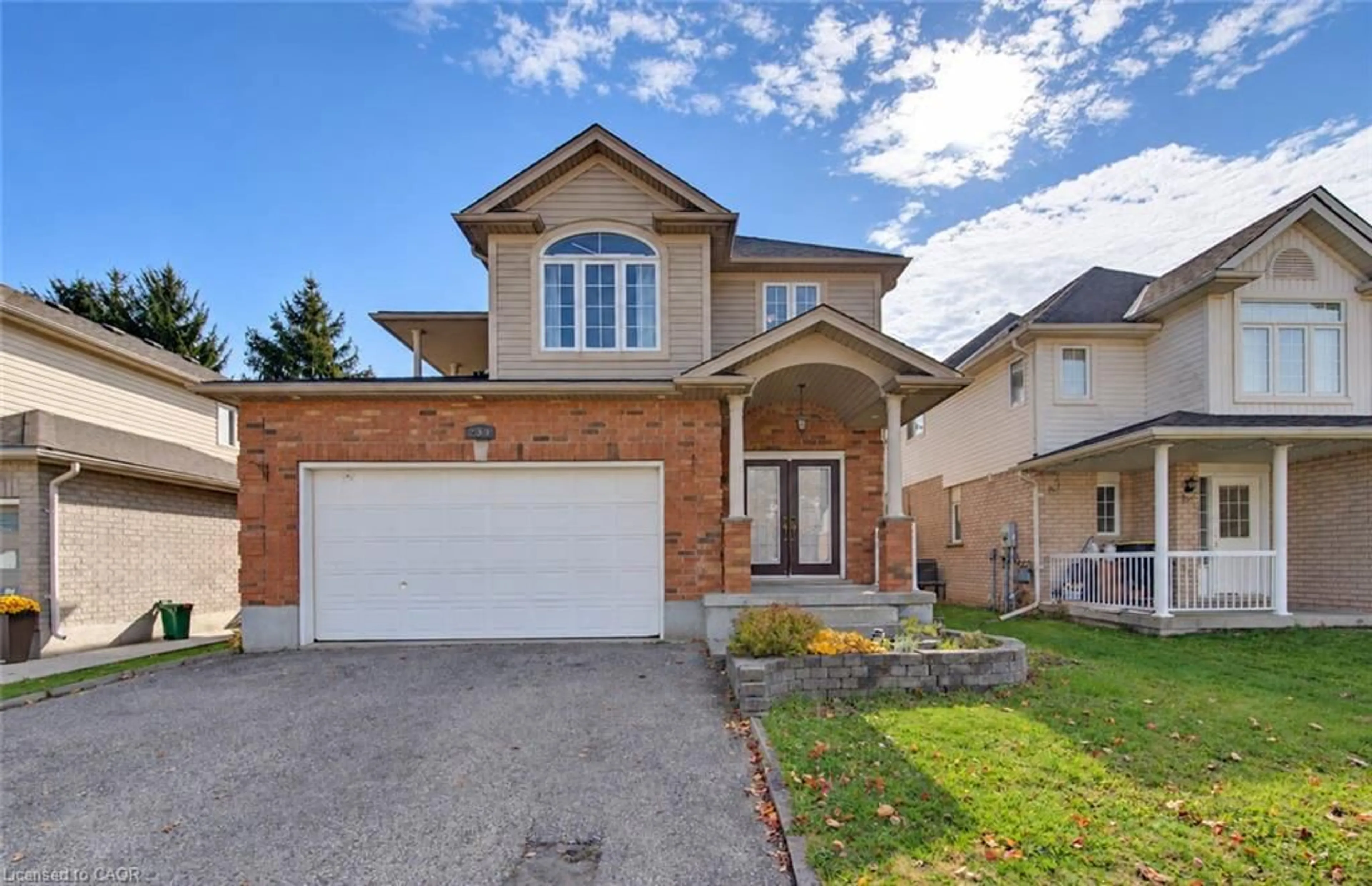 Home with brick exterior material, street for 233 Oprington Pl, Kitchener Ontario N2N 3P3