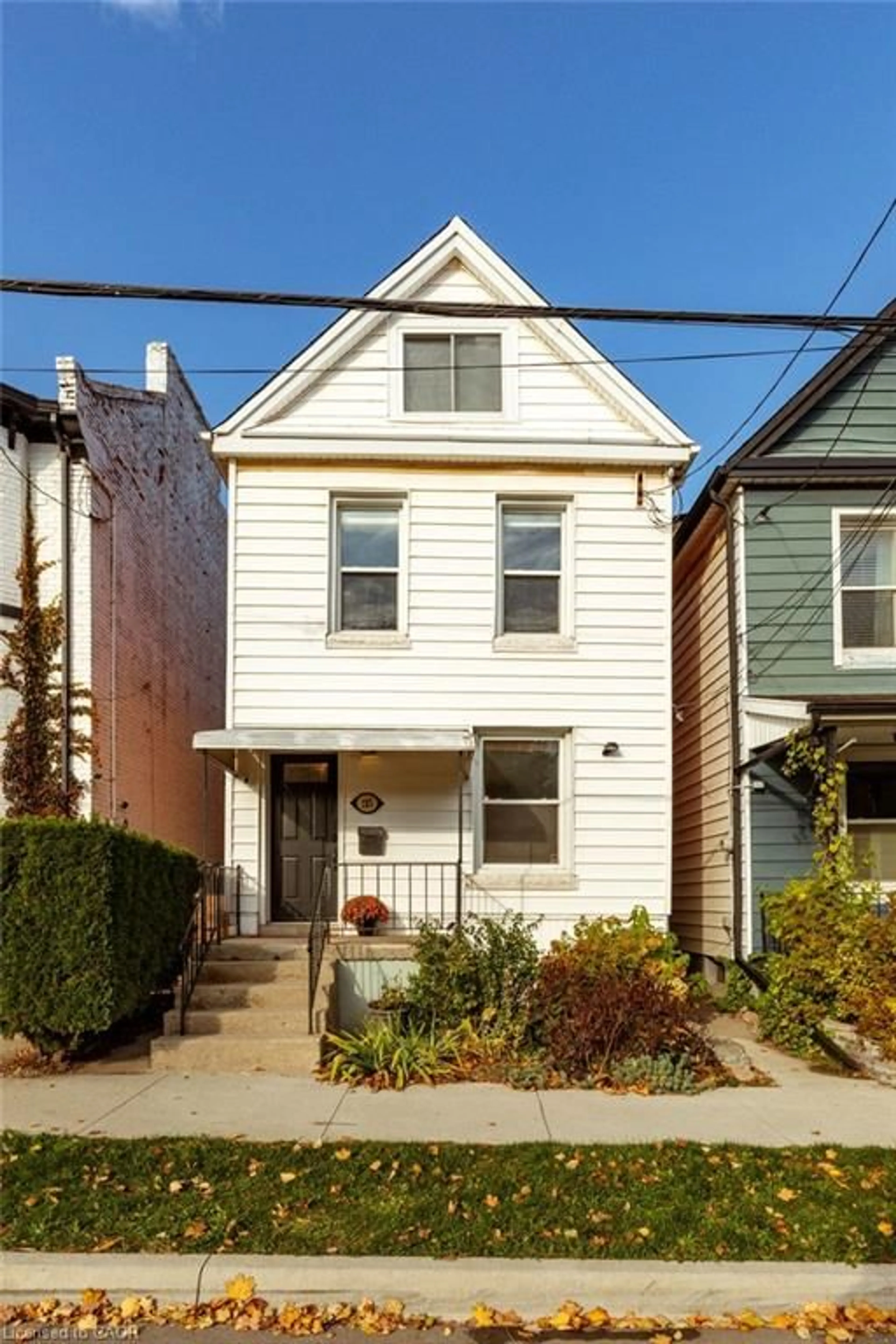 Home with brick exterior material, street for 185 Caroline St, Hamilton Ontario L8R 2S1