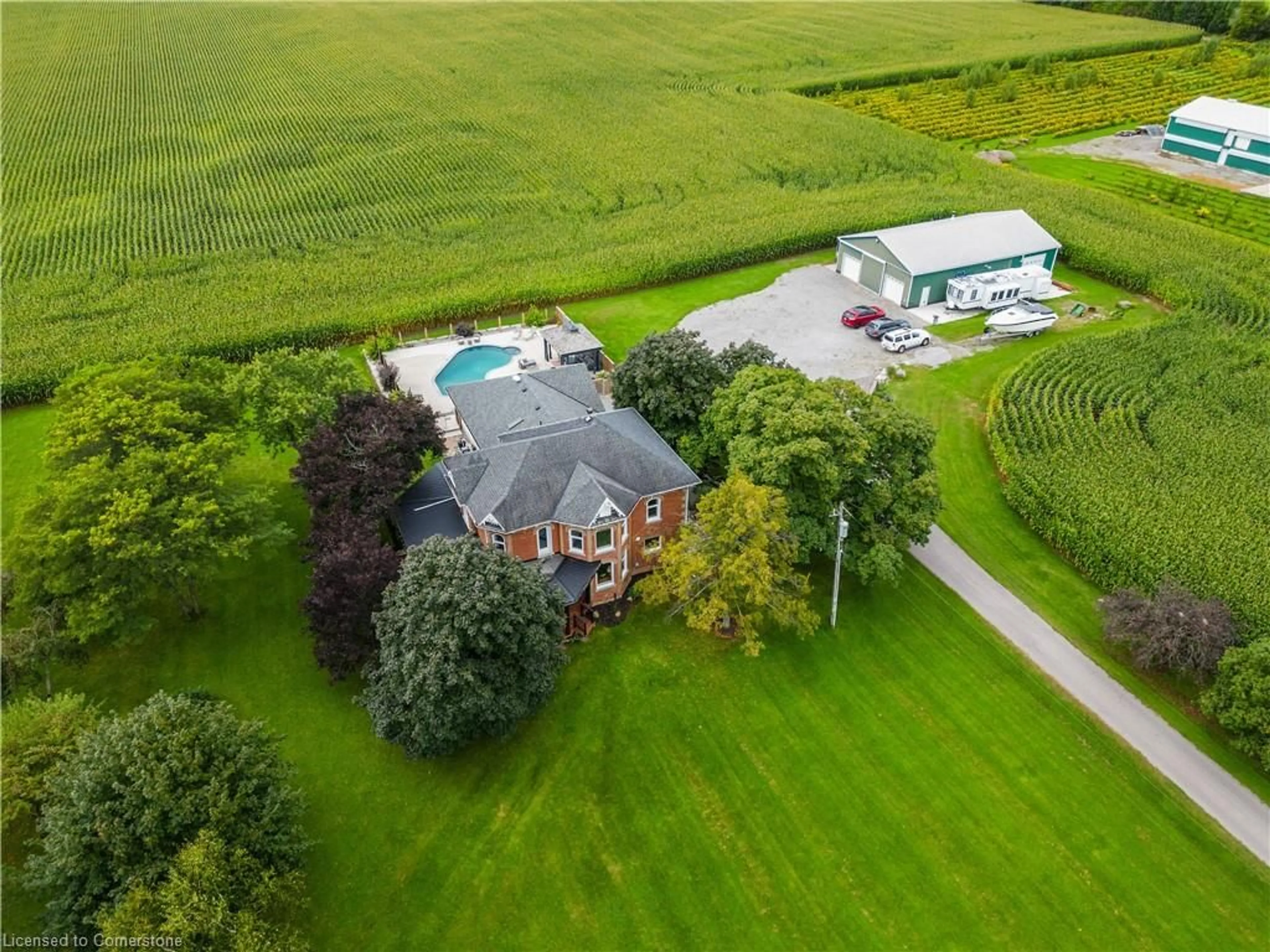 Frontside or backside of a home, the fenced backyard for 400 3rd Line, Hagersville Ontario N0A 1H0