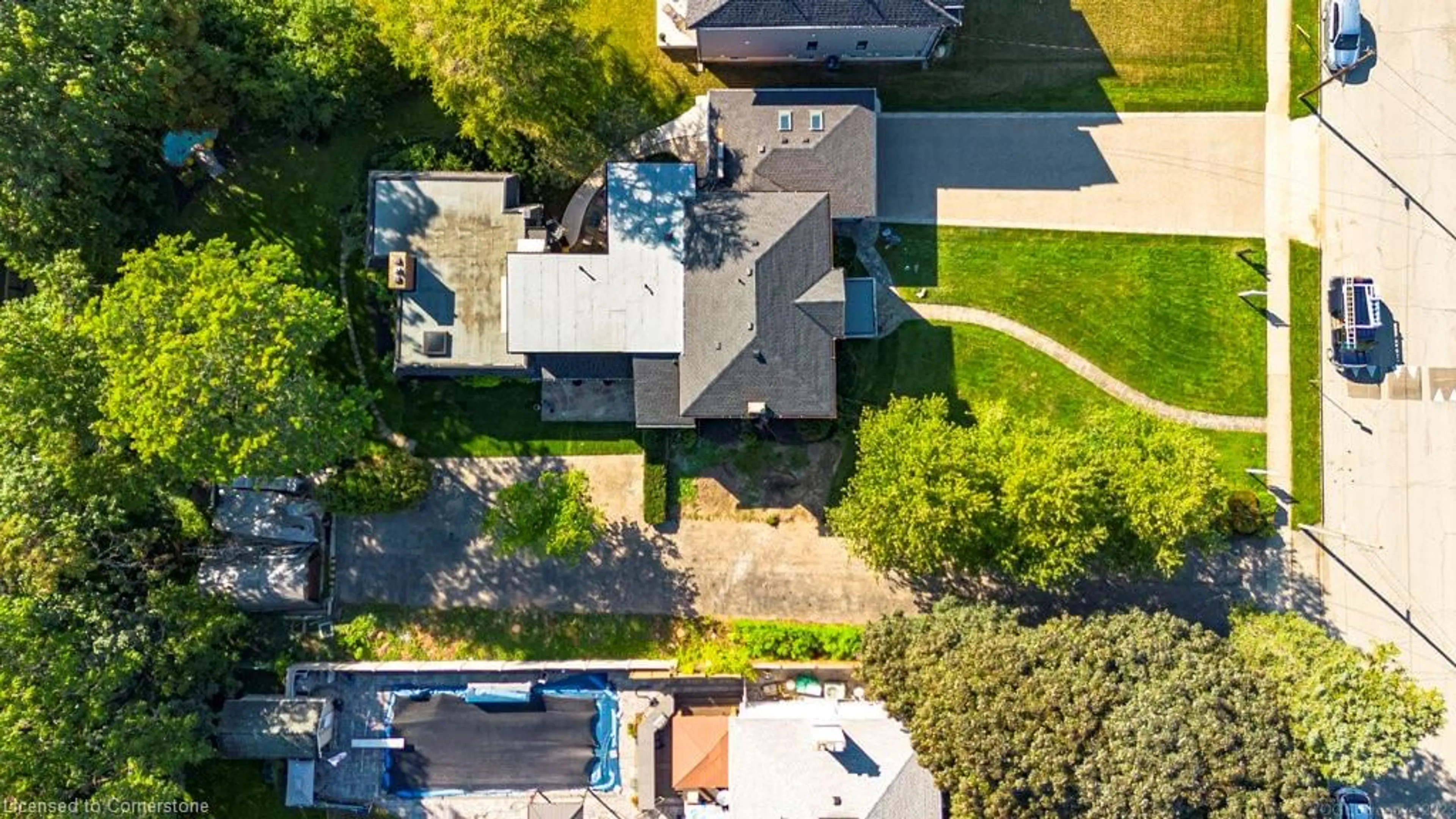 Frontside or backside of a home, the fenced backyard for 182 Concession St, Hamilton Ontario L9A 1A8