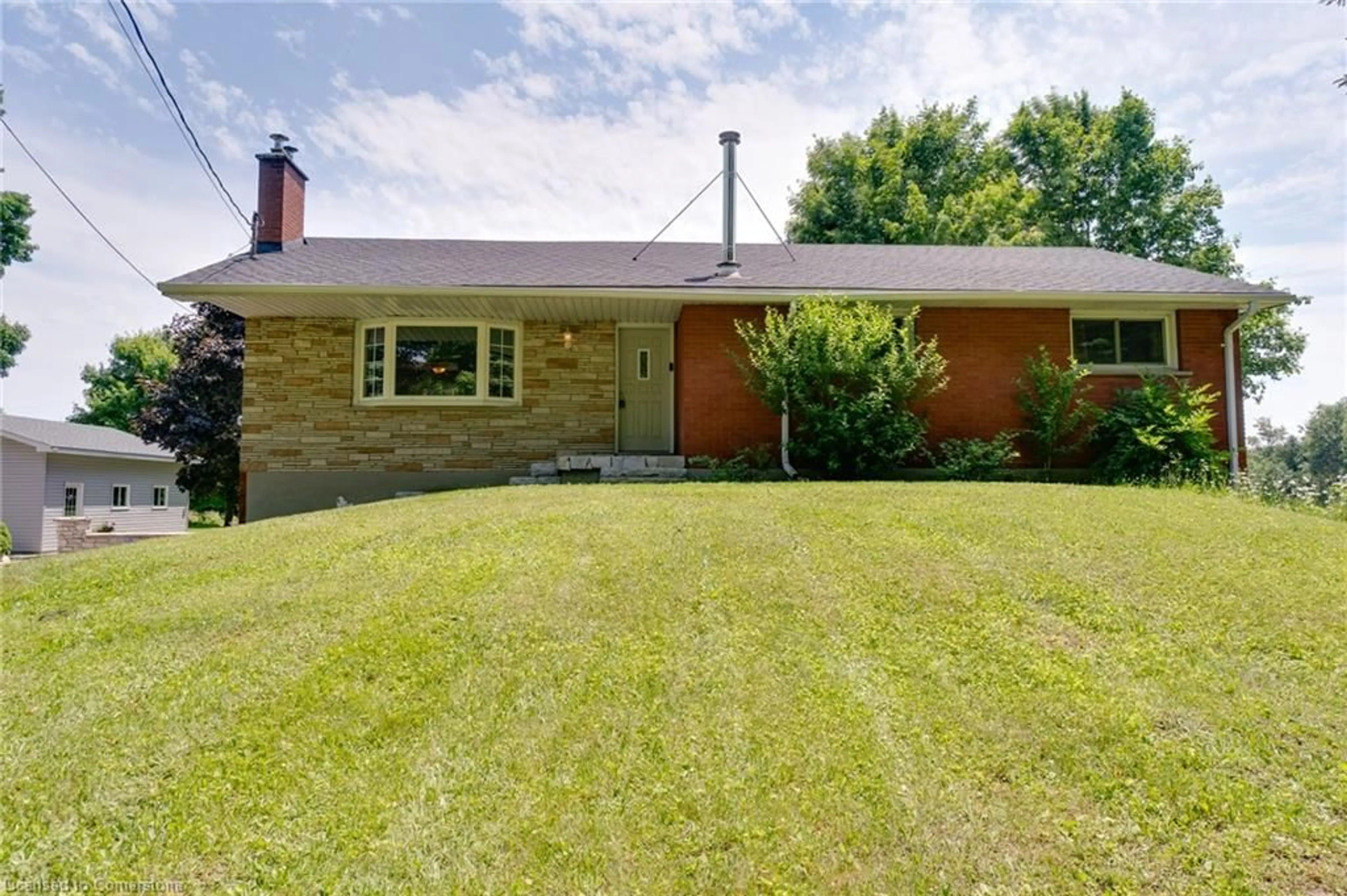 Frontside or backside of a home for 7718 22 Side Road, Halton Hills Ontario L7J 2M1